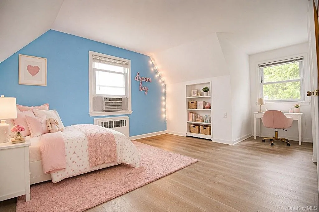 Photo Visually Staged. Upstairs Second Bedroom has a large closet and access to additional storage. The bedroom is approx. 17'-5" x 10'-11" Photo Visually Staged. Upstairs Second Bedroom has a large closet and access to additional storage. The bedroom is approx. 17'-5" x 10'-11"