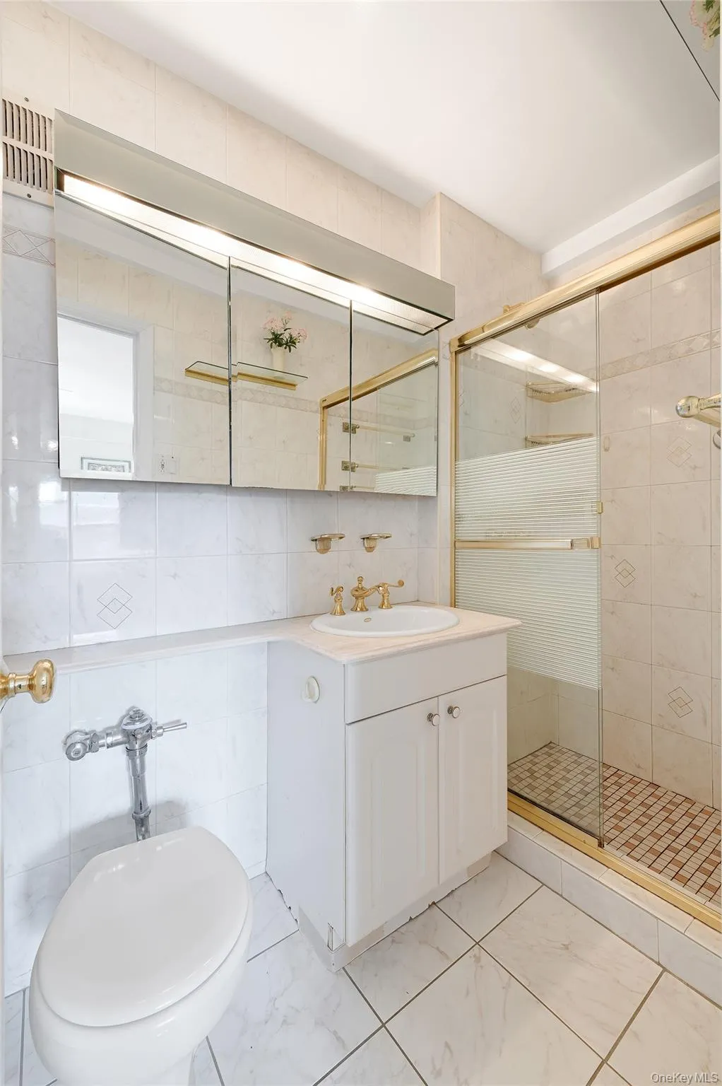 En-suite bathroom with stall shower En-suite bathroom with stall shower