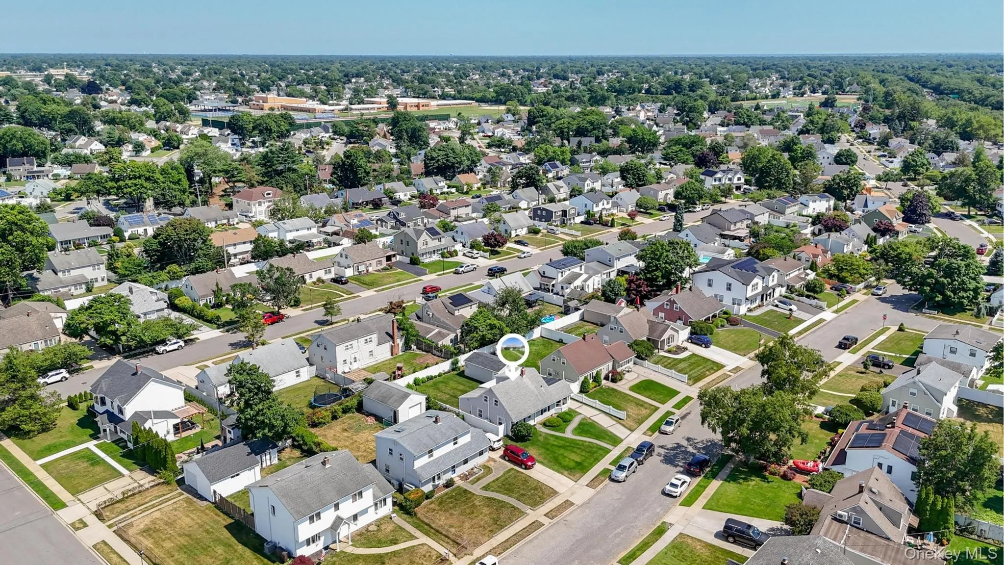Residential neighborhood with established streets and mature trees Residential neighborhood with established streets and mature trees