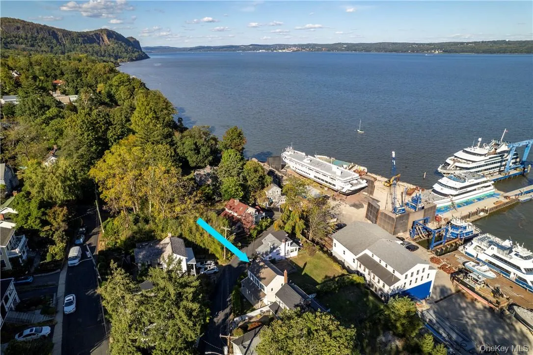 Birds eye view of property featuring a water view Birds eye view of property featuring a water view