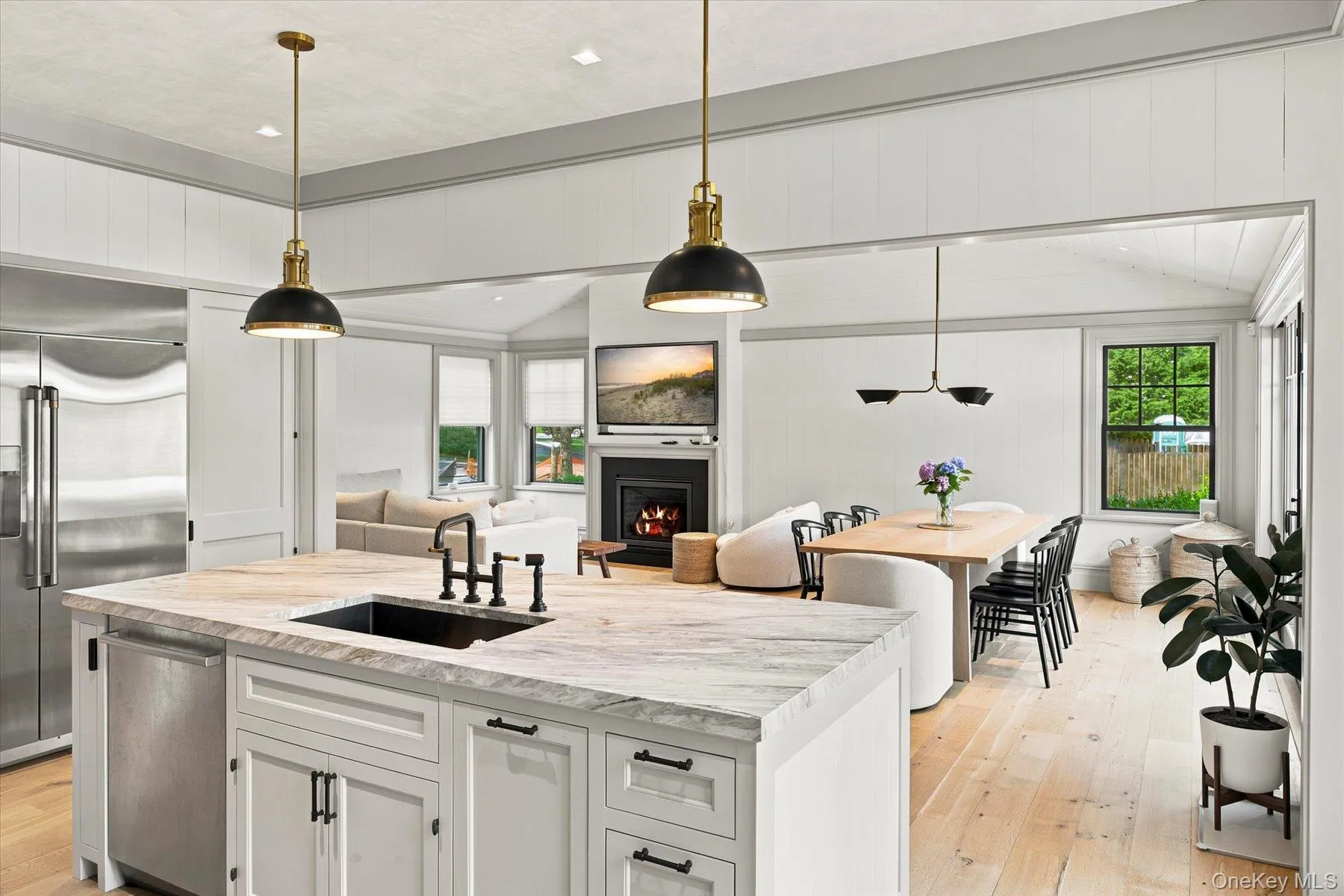 Gourmet kitchen island featuring a deep undermount sink and integrated dishwasher Gourmet kitchen island featuring a deep undermount sink and integrated dishwasher