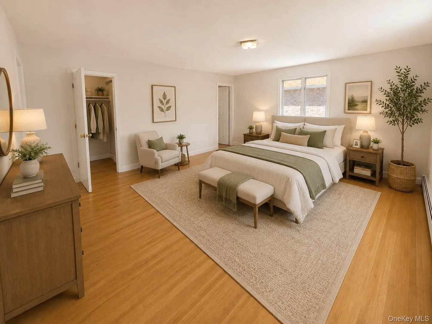 Spacious bedroom featuring wood-finish flooring, a neutral color palette, a window for natural light, and a built-in closet Spacious bedroom featuring wood-finish flooring, a neutral color palette, a window for natural light, and a built-in closet