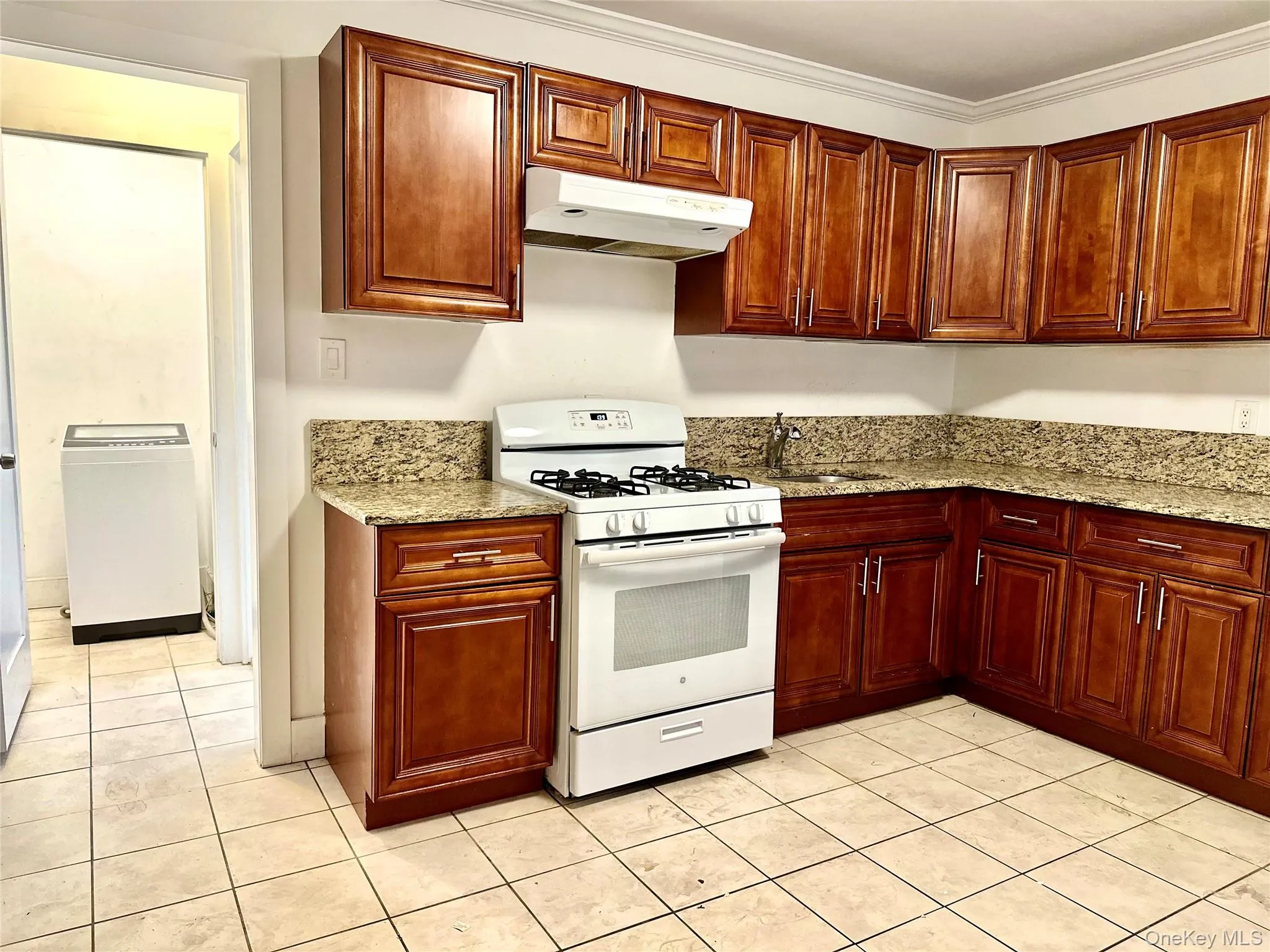 Another view of the kitchen Another view of the kitchen