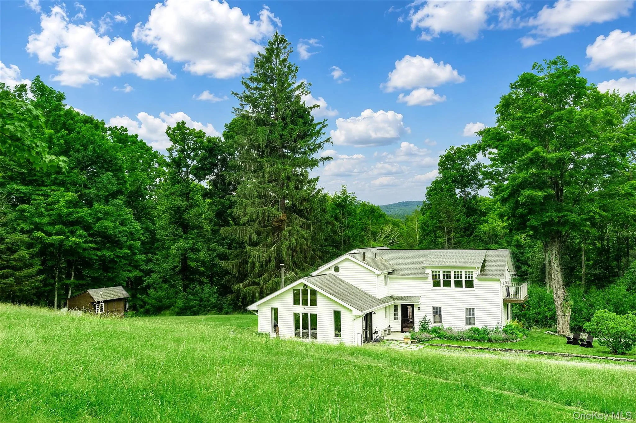 Among the many beautiful views is the dramatic view of the home with a Catskill Mountain background. Among the many beautiful views is the dramatic view of the home with a Catskill Mountain background.