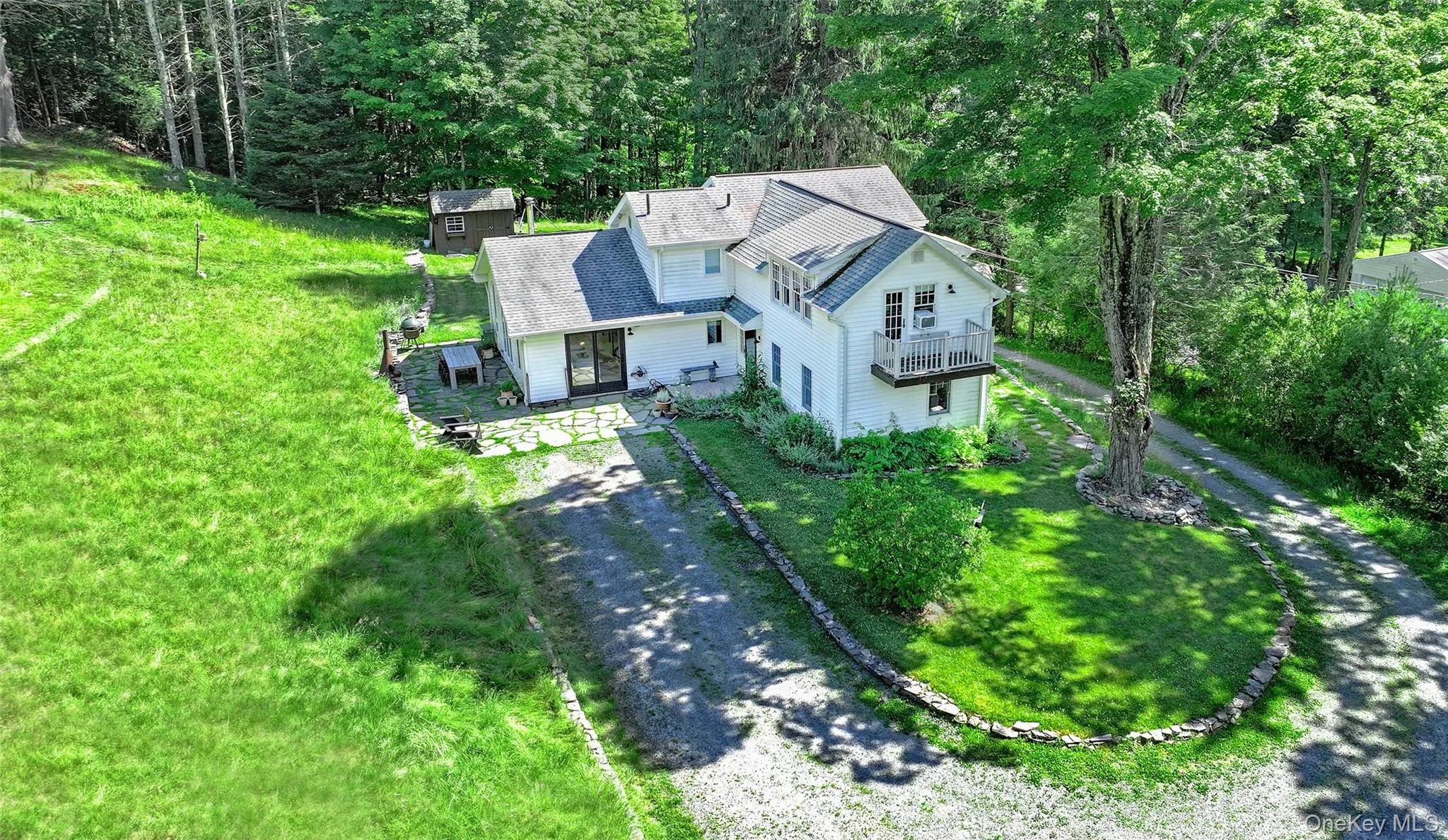 Home surrounded by the driveway entrance. Home surrounded by the driveway entrance.