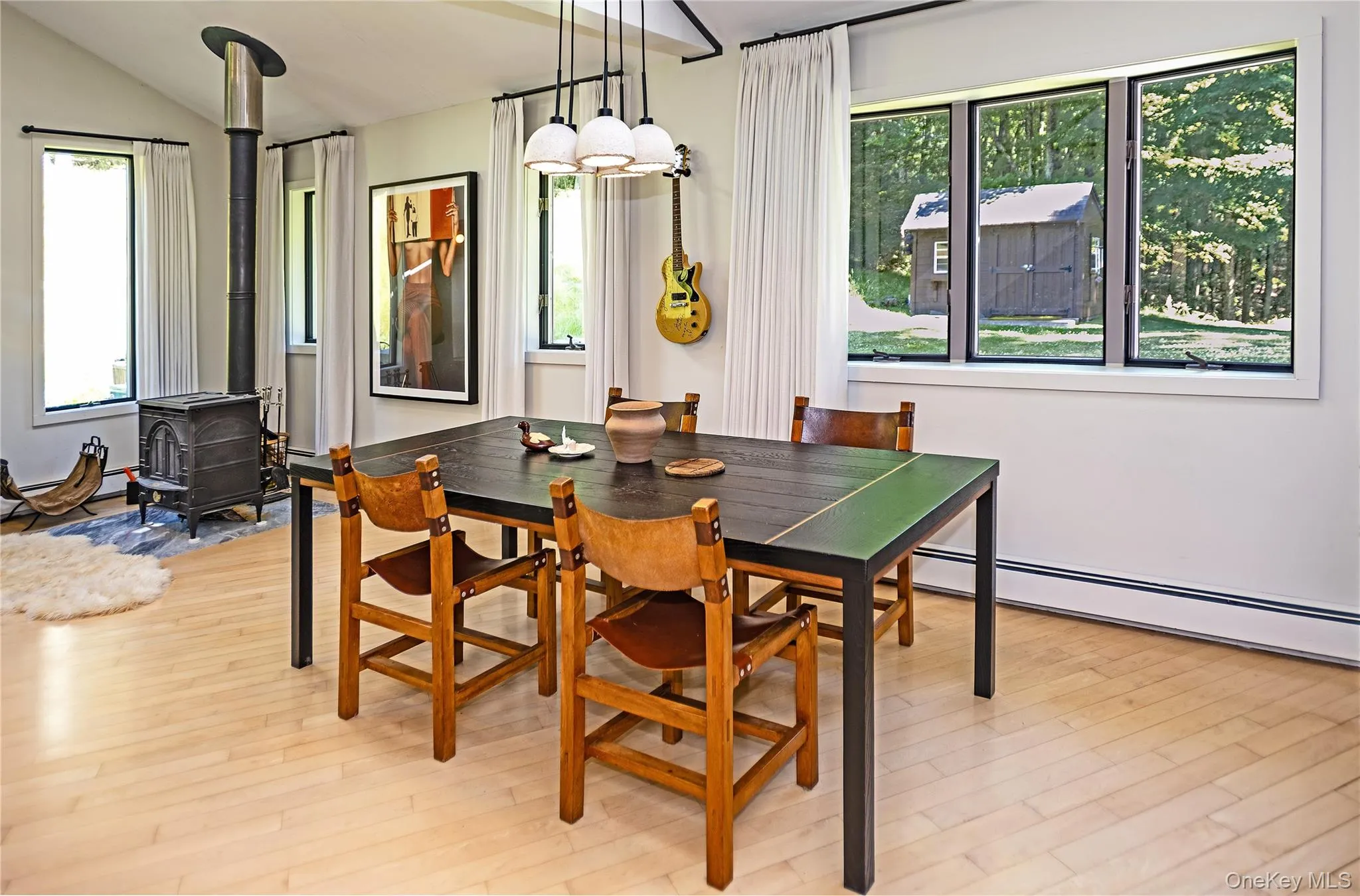 Dining room table with large view of the backyard. Dining room table with large view of the backyard.