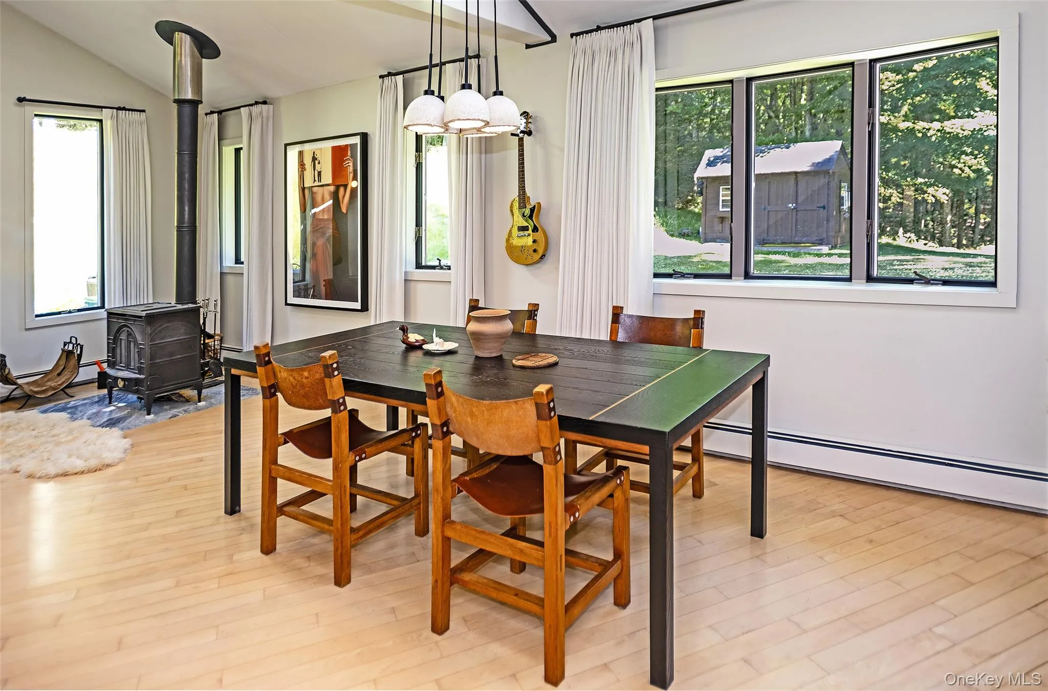 Dining room table with large view of the backyard. Dining room table with large view of the backyard.