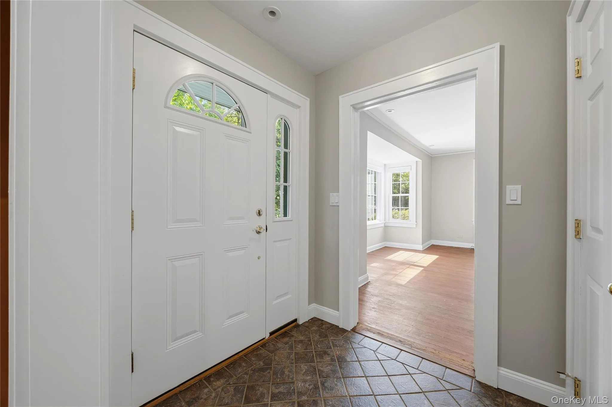 Step inside the Entry Foyer and glance into the freshly refinished floors of the Living Room. Step inside the Entry Foyer and glance into the freshly refinished floors of the Living Room.