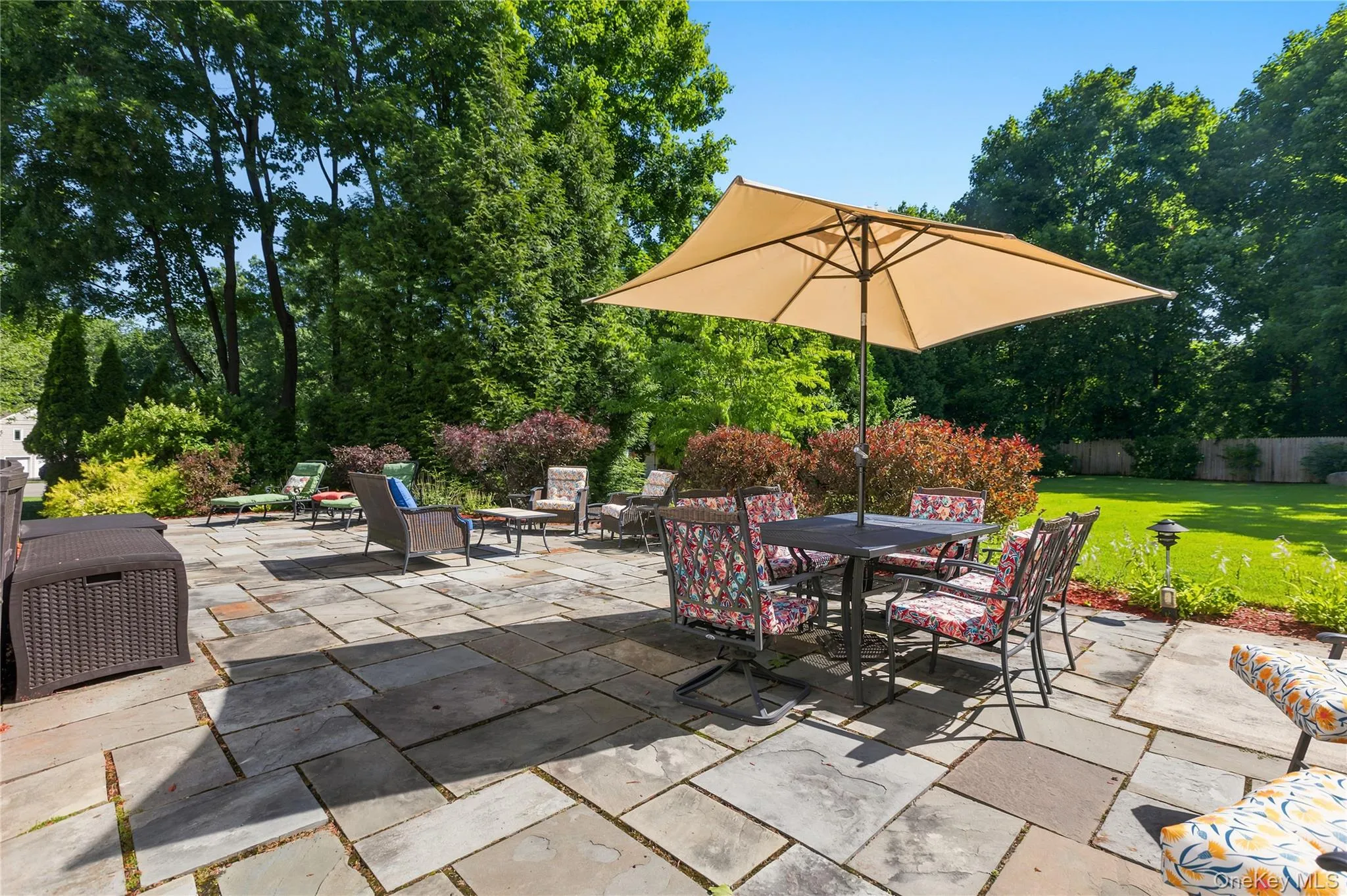 Step out from the side entrance and enjoy Spring, Summer and Fall nights on you expansive flagstone Patio. Step out from the side entrance and enjoy Spring, Summer and Fall nights on you expansive flagstone Patio.