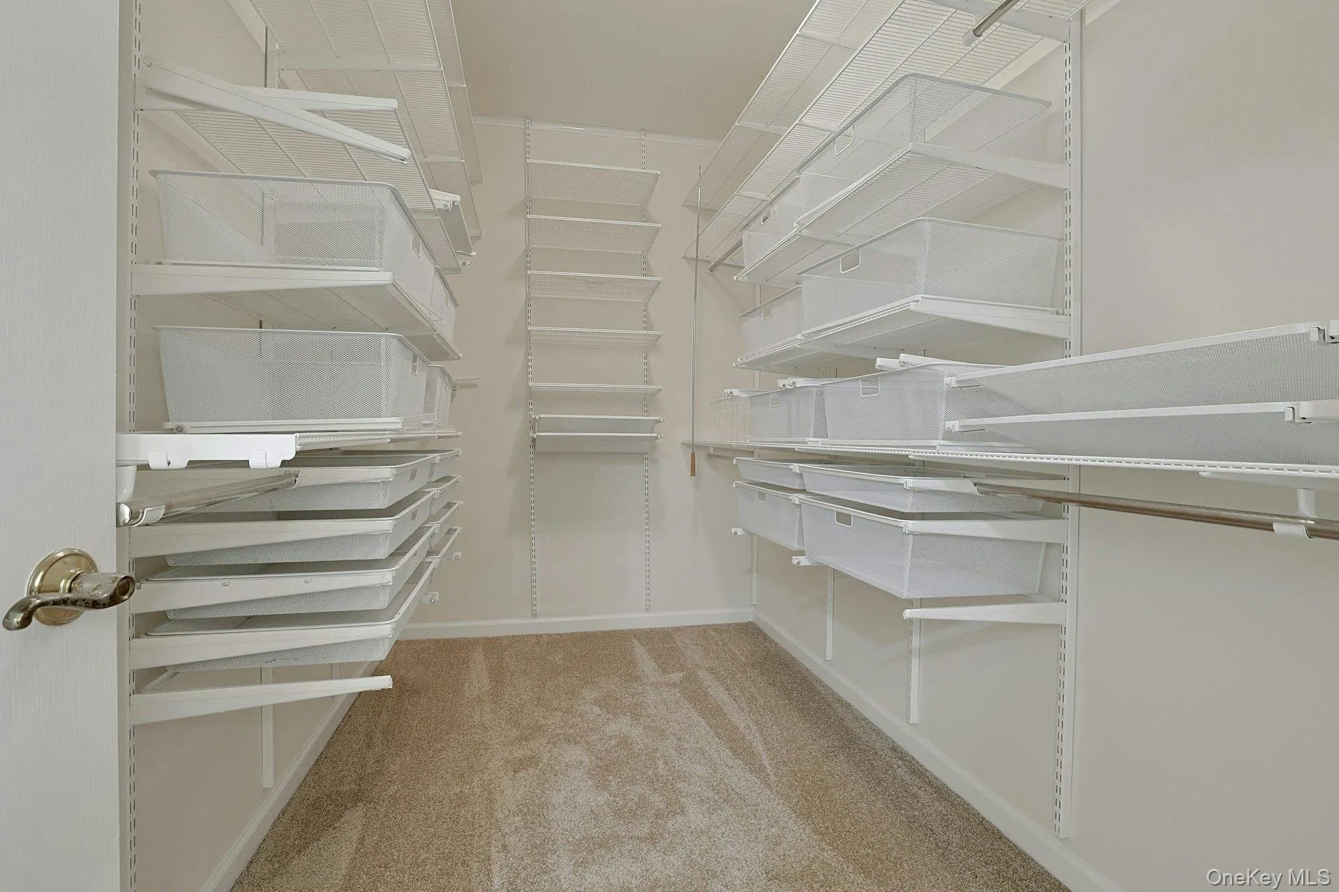Walk in closet in primary bathroom Walk in closet in primary bathroom