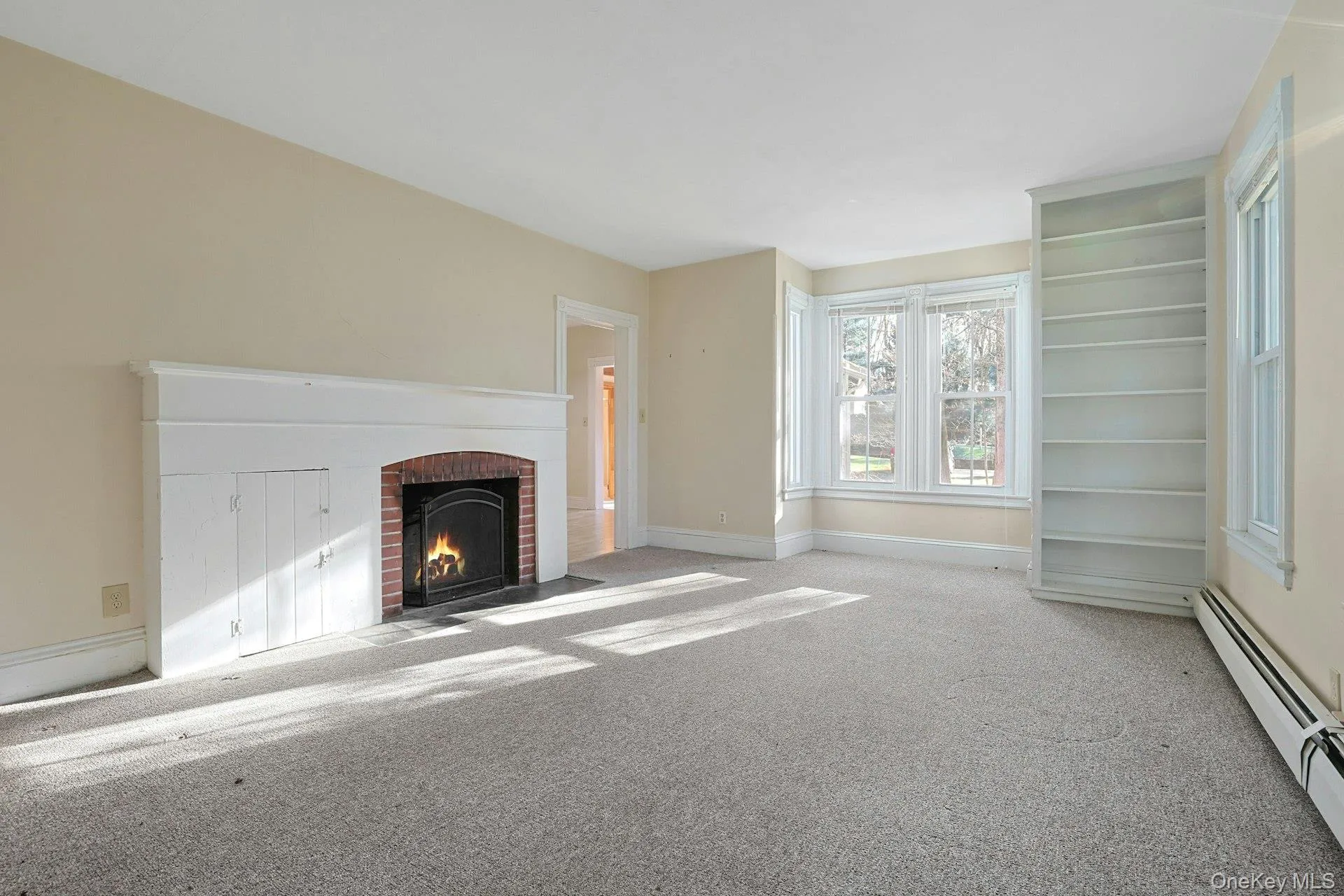 Living room w/wood burning fireplace Living room w/wood burning fireplace
