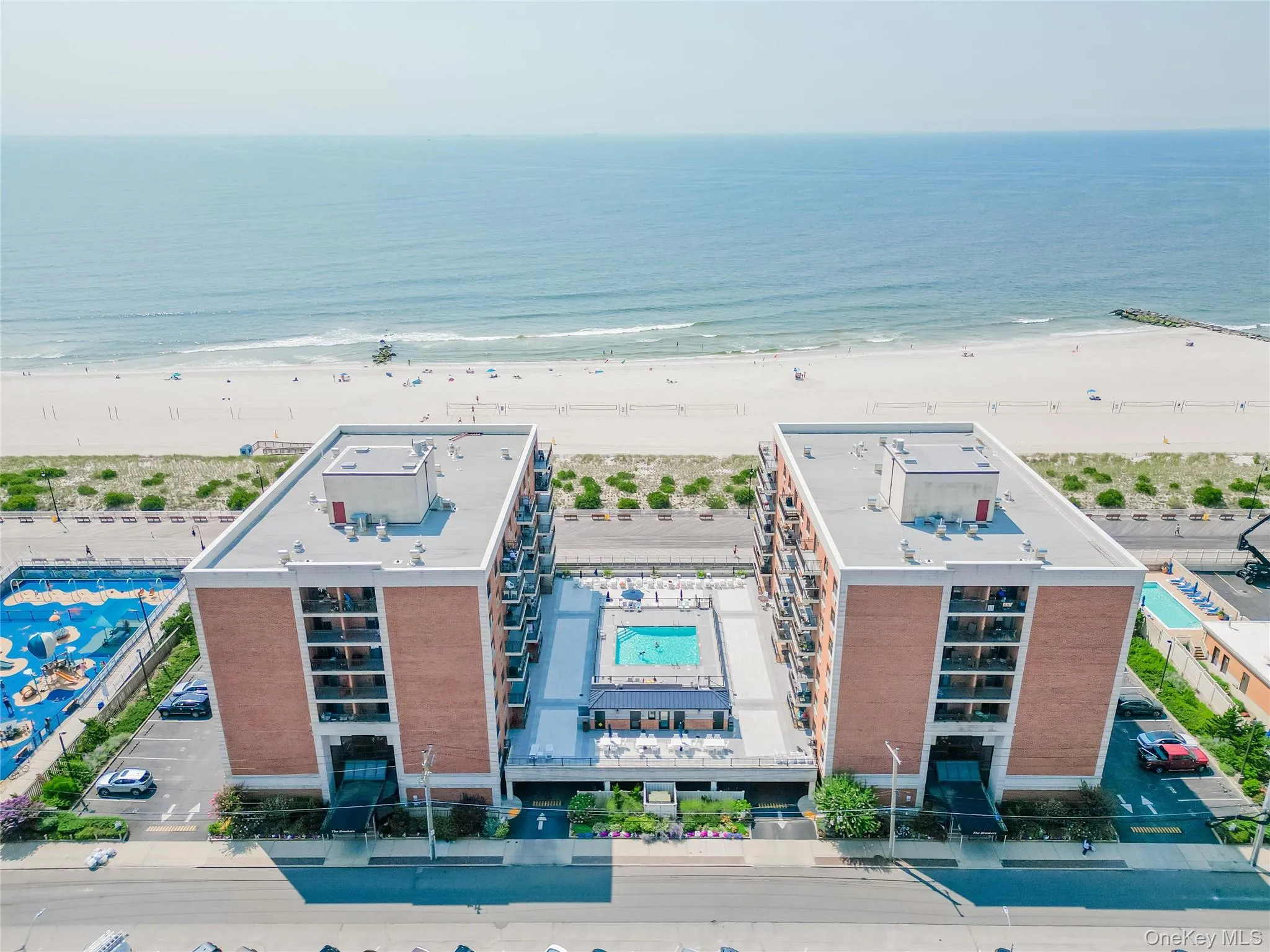 Drone / aerial view of a pool and unending shoreline Drone / aerial view of a pool and unending shoreline