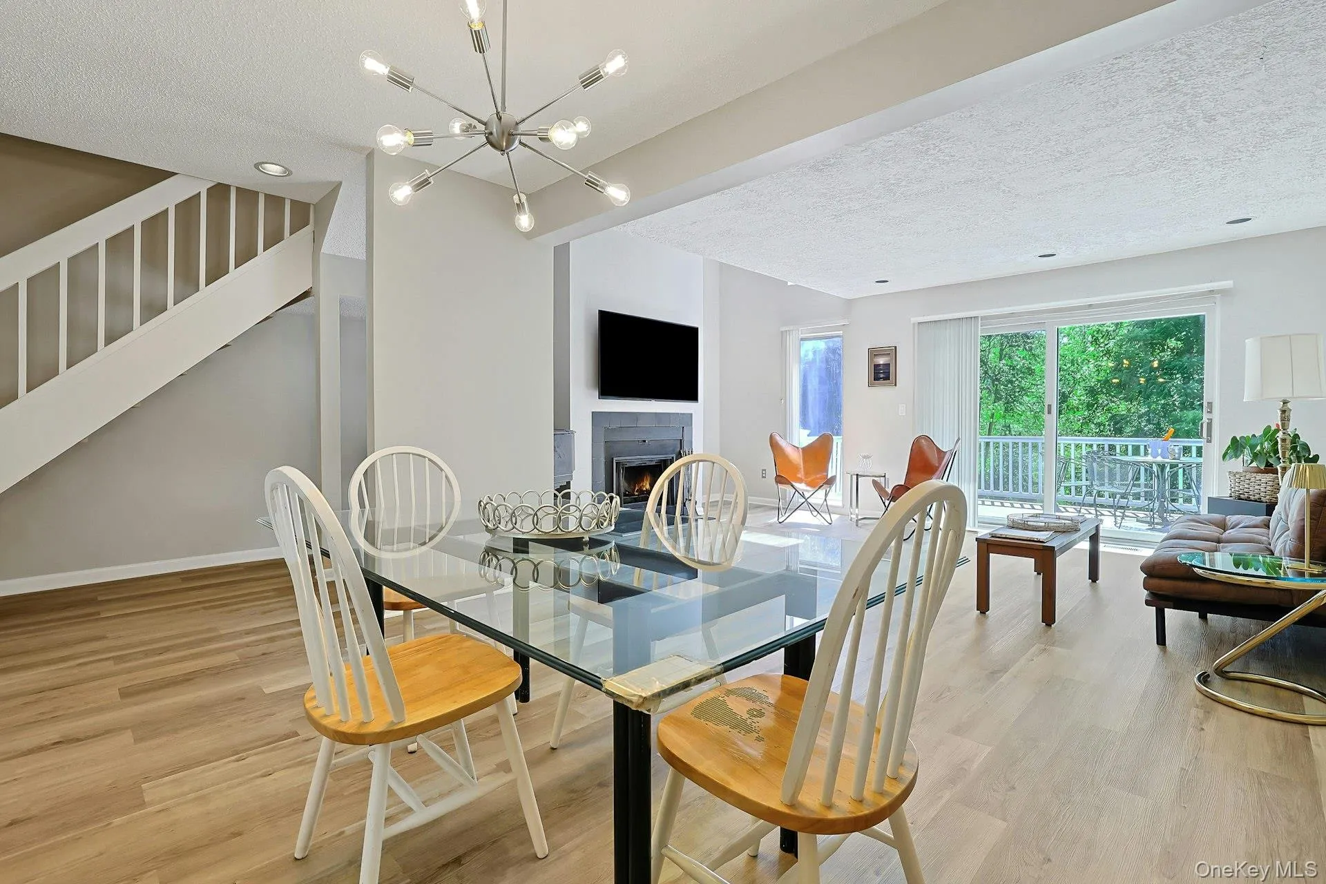 The dining area also enjoys the warmth and ambiance of the fireplace. The dining area also enjoys the warmth and ambiance of the fireplace.