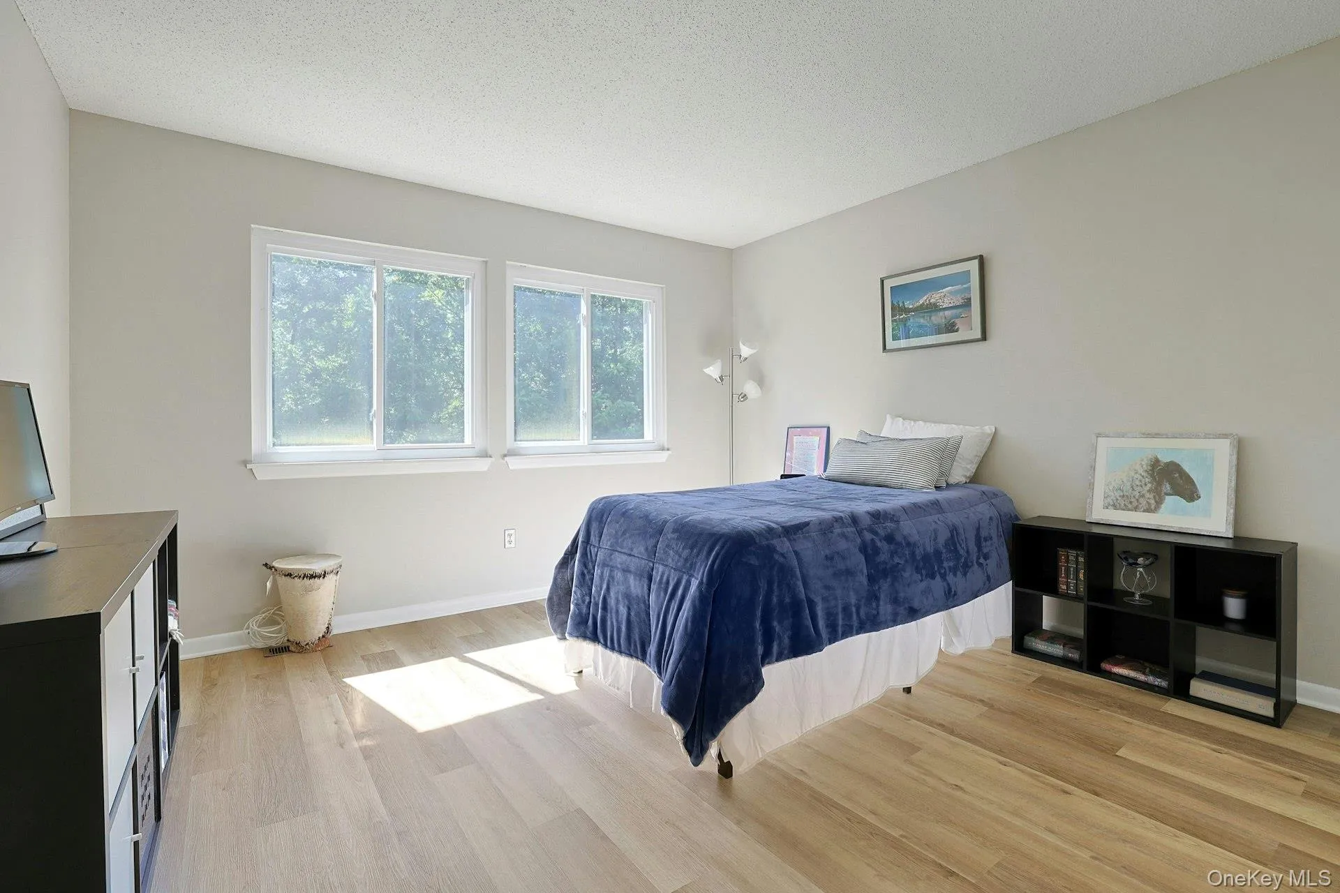 Light-filled second bedroom with room for guests, work, or everyday use. Light-filled second bedroom with room for guests, work, or everyday use.