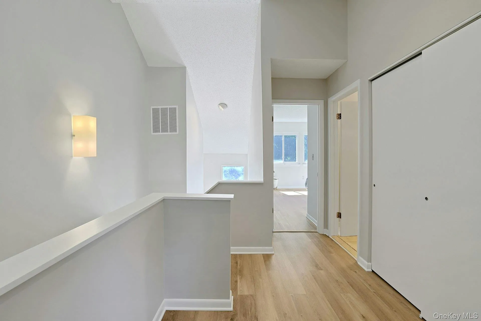 The hallway connects the bedrooms and bathroom, offering a comfortable and convenient layout for everyday living. The hallway connects the bedrooms and bathroom, offering a comfortable and convenient layout for everyday living.