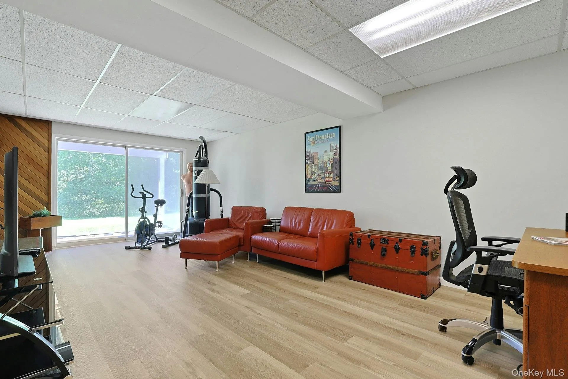 The Spacious lower level with room for a workout area, plus sliding glass doors to the covered patio. The Spacious lower level with room for a workout area, plus sliding glass doors to the covered patio.