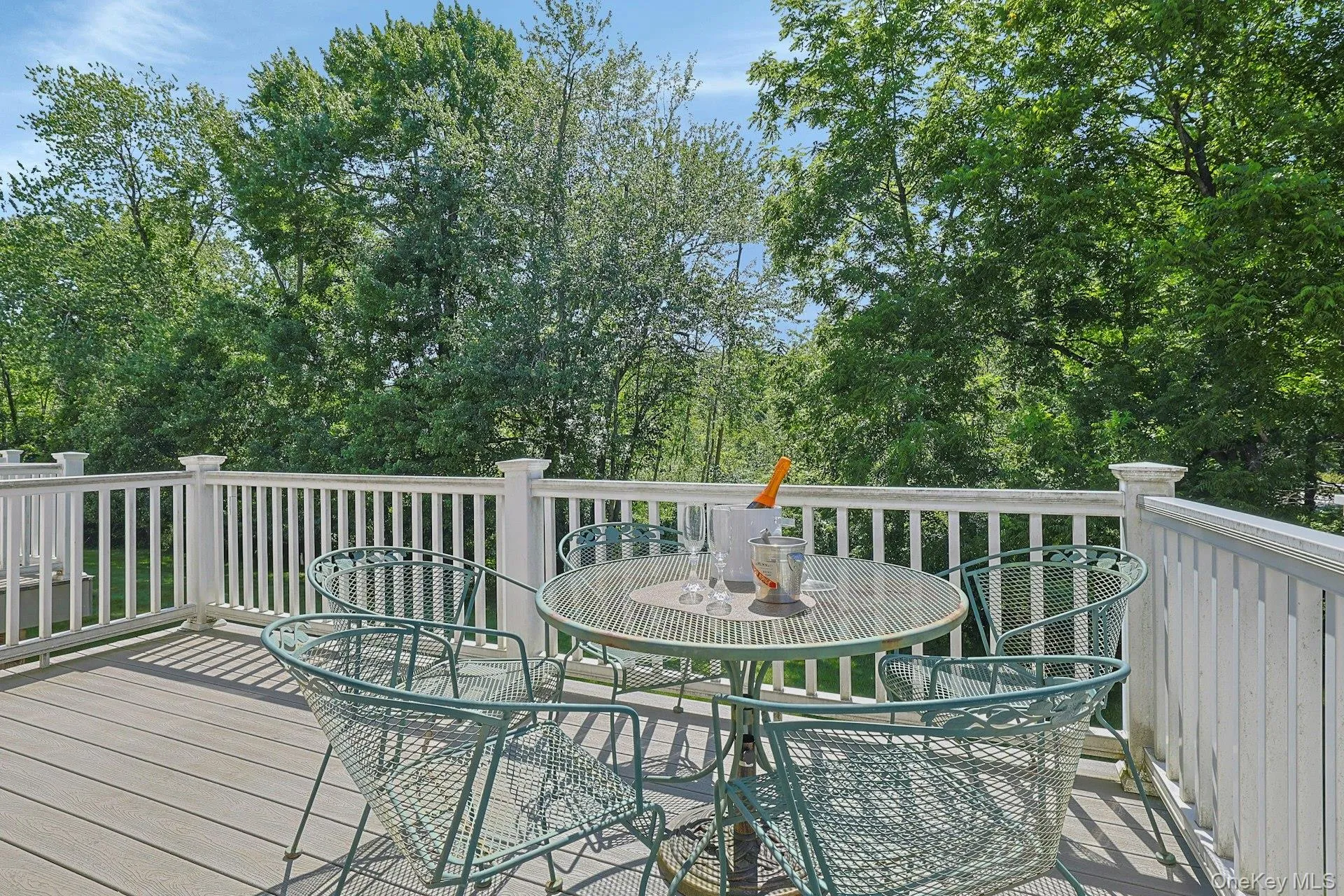 Enjoy outdoor living on the large deck with beautiful wooded views. Enjoy outdoor living on the large deck with beautiful wooded views.