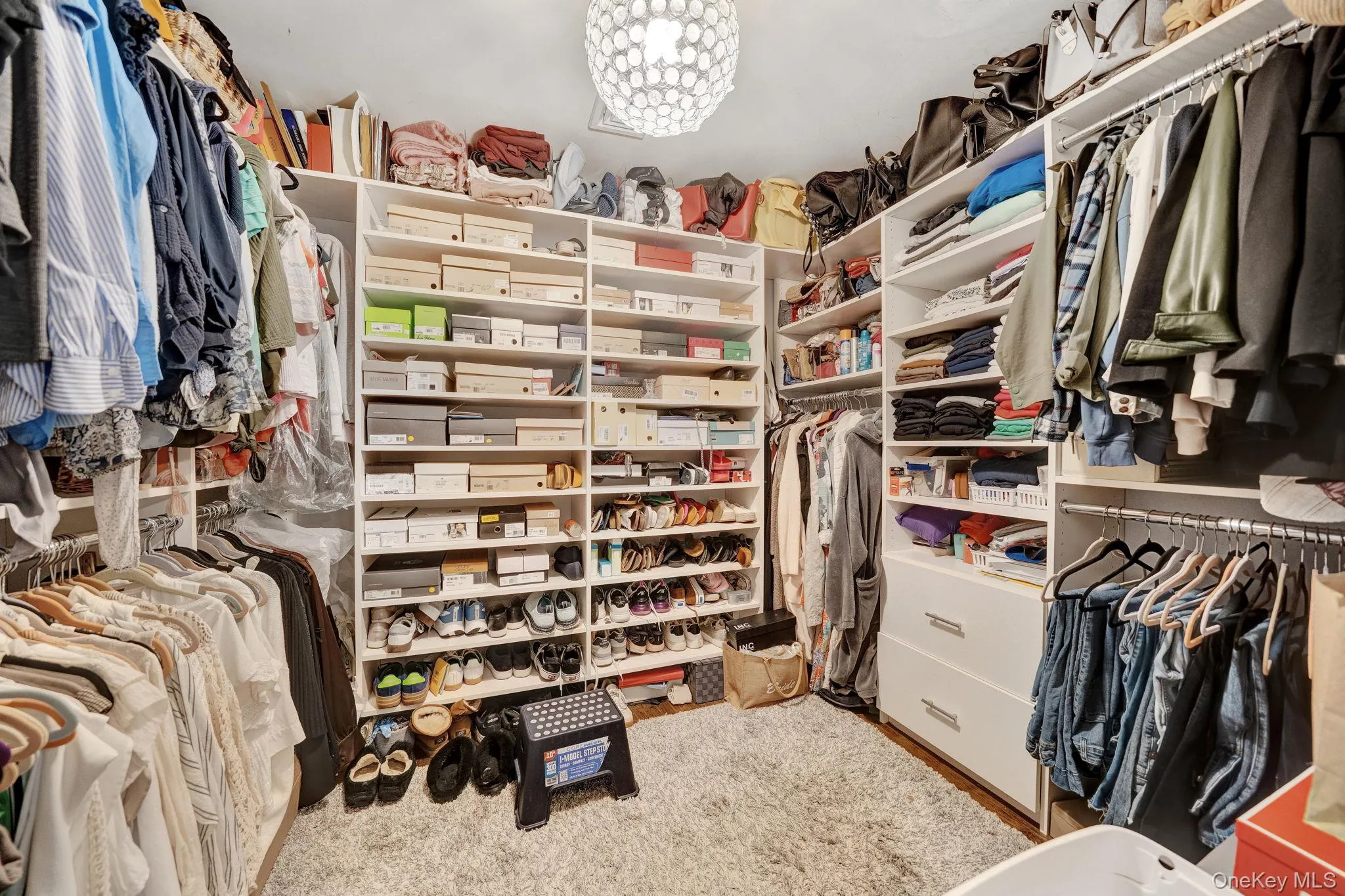 Primary walk in closet Primary walk in closet