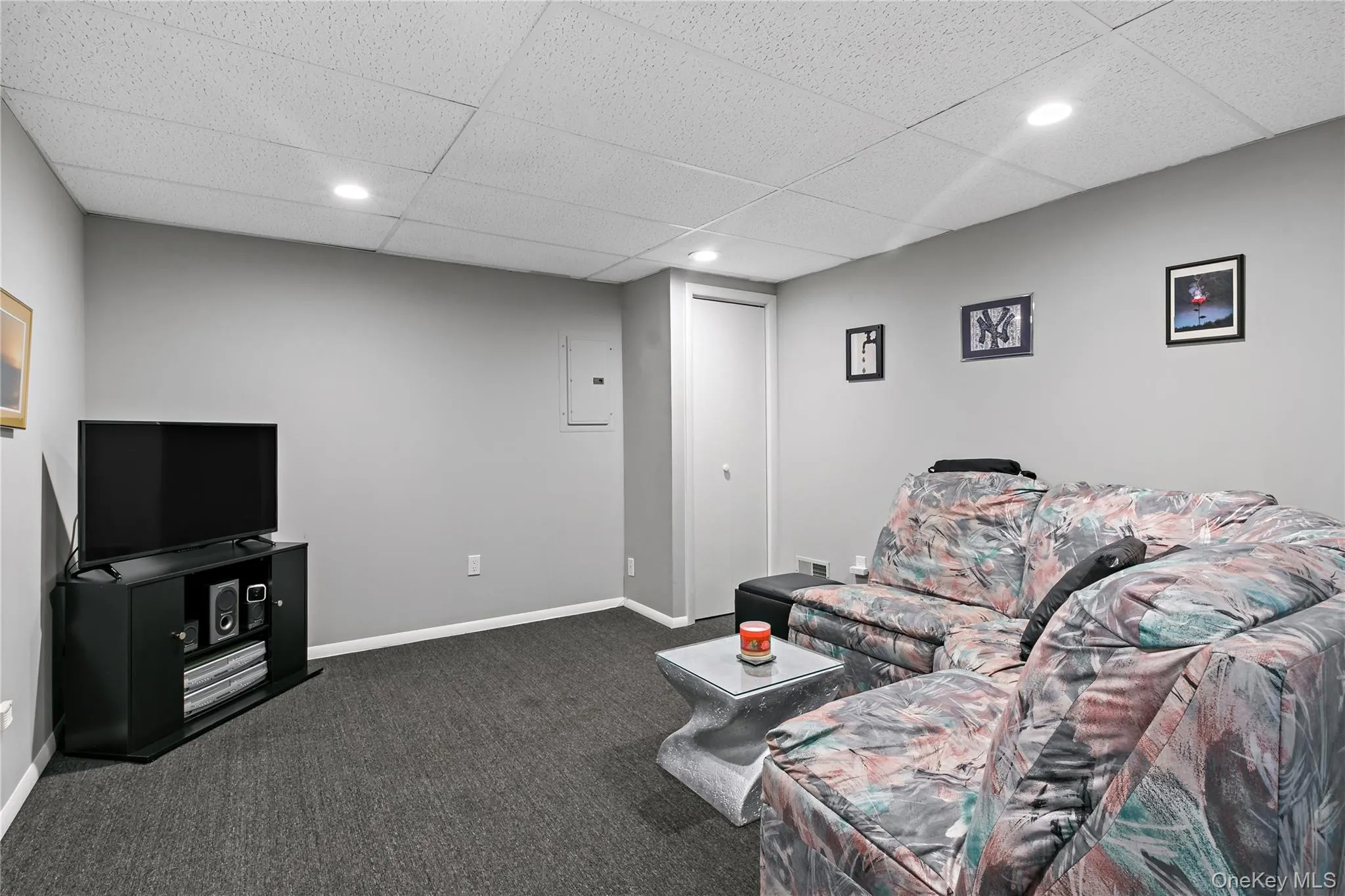Den in the lower level, all LED lighting and new ceiling tiles . Den in the lower level, all LED lighting and new ceiling tiles .
