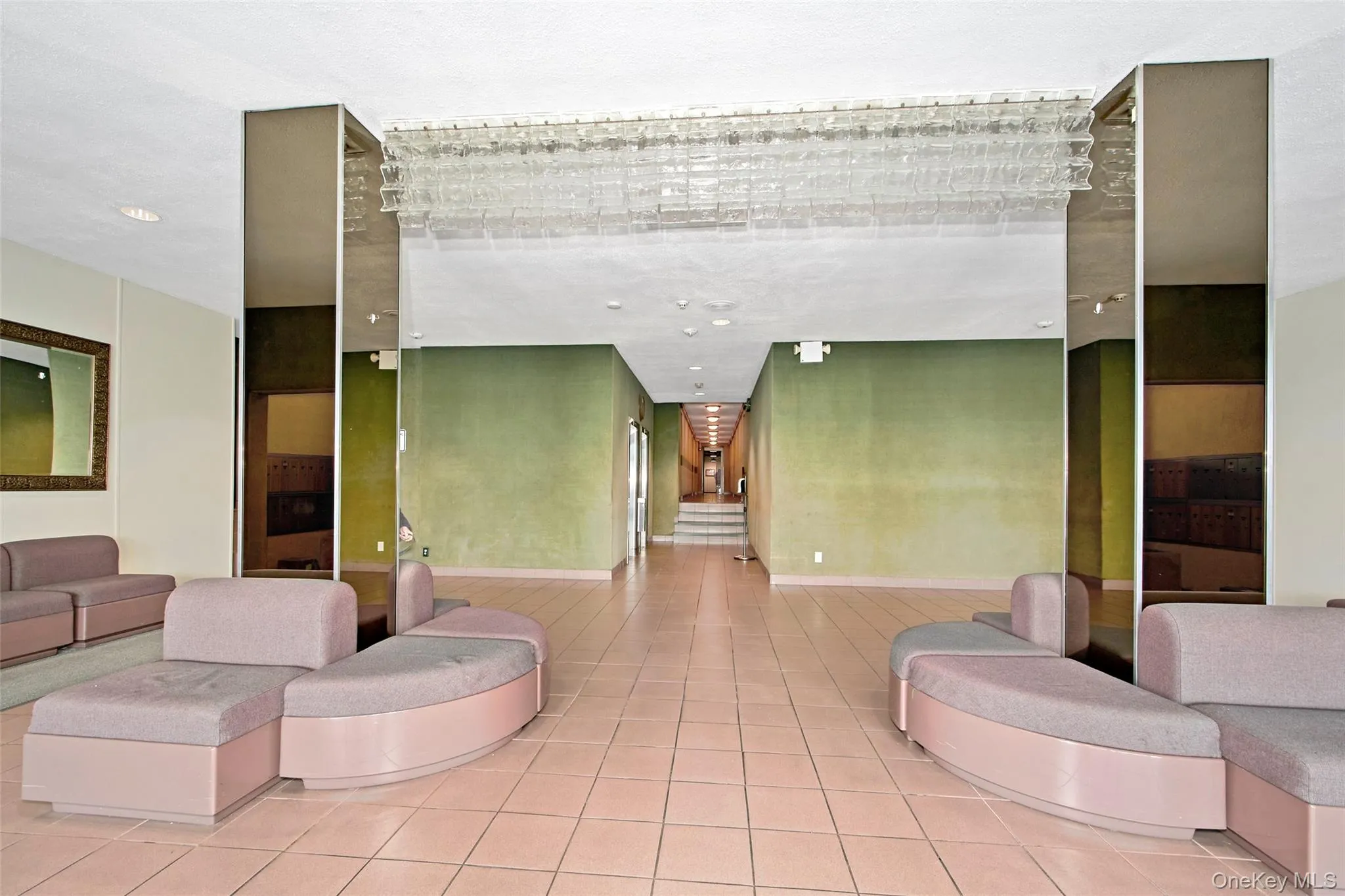 Another view of the building’s entry foyer and access to the elevators. Another view of the building’s entry foyer and access to the elevators.
