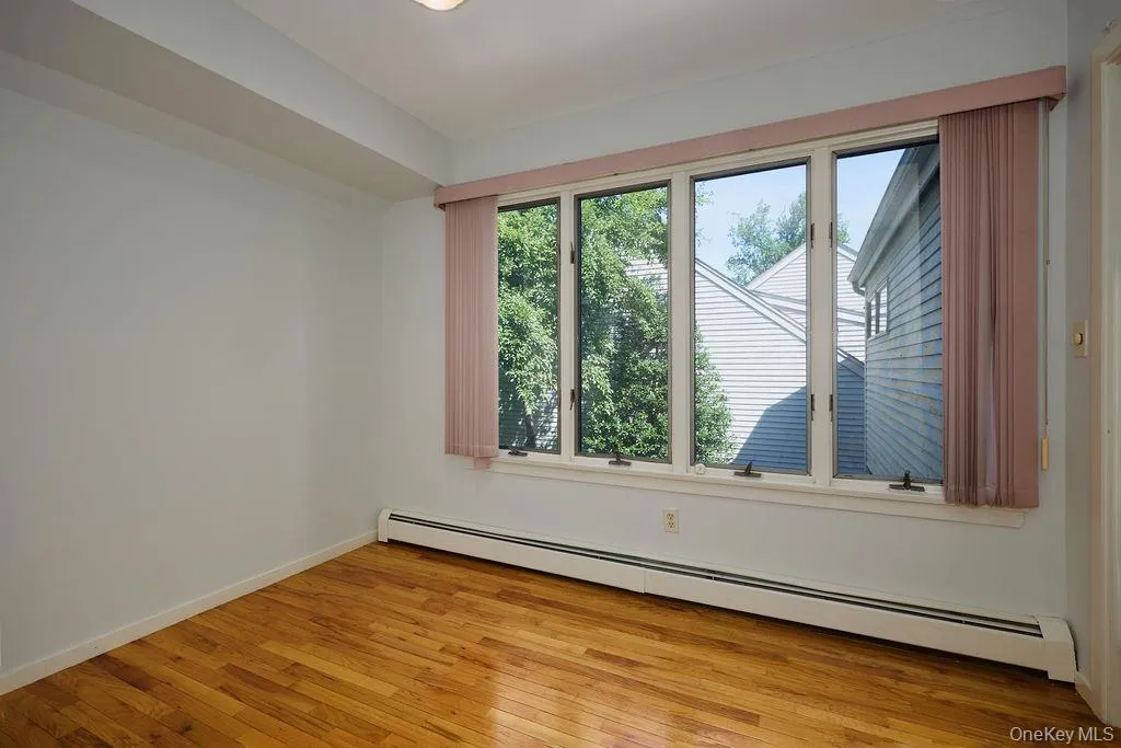 2nd Bedroom upstairs. Beautiful hardwood floors 2nd Bedroom upstairs. Beautiful hardwood floors