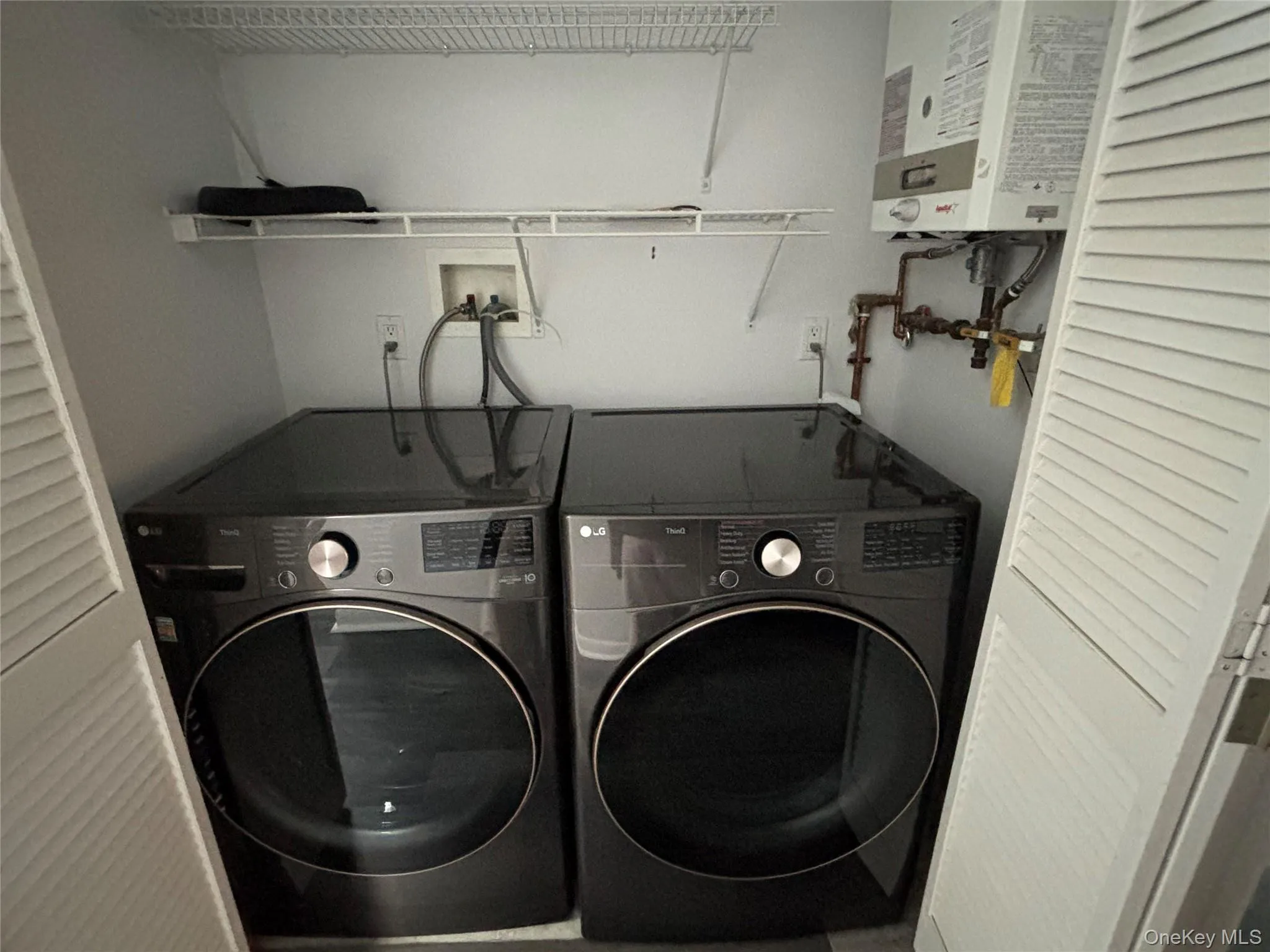 In unit laundry closet In unit laundry closet