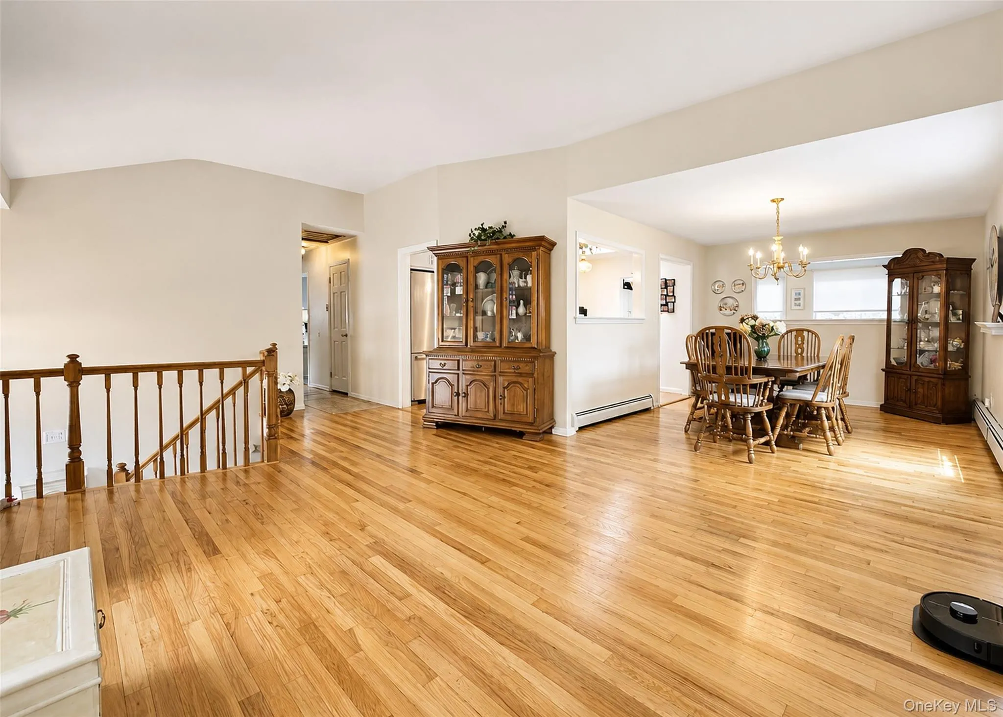 Upper Level - Sun-Lit Living Rm With HW Flooring. Upper Level - Sun-Lit Living Rm With HW Flooring.