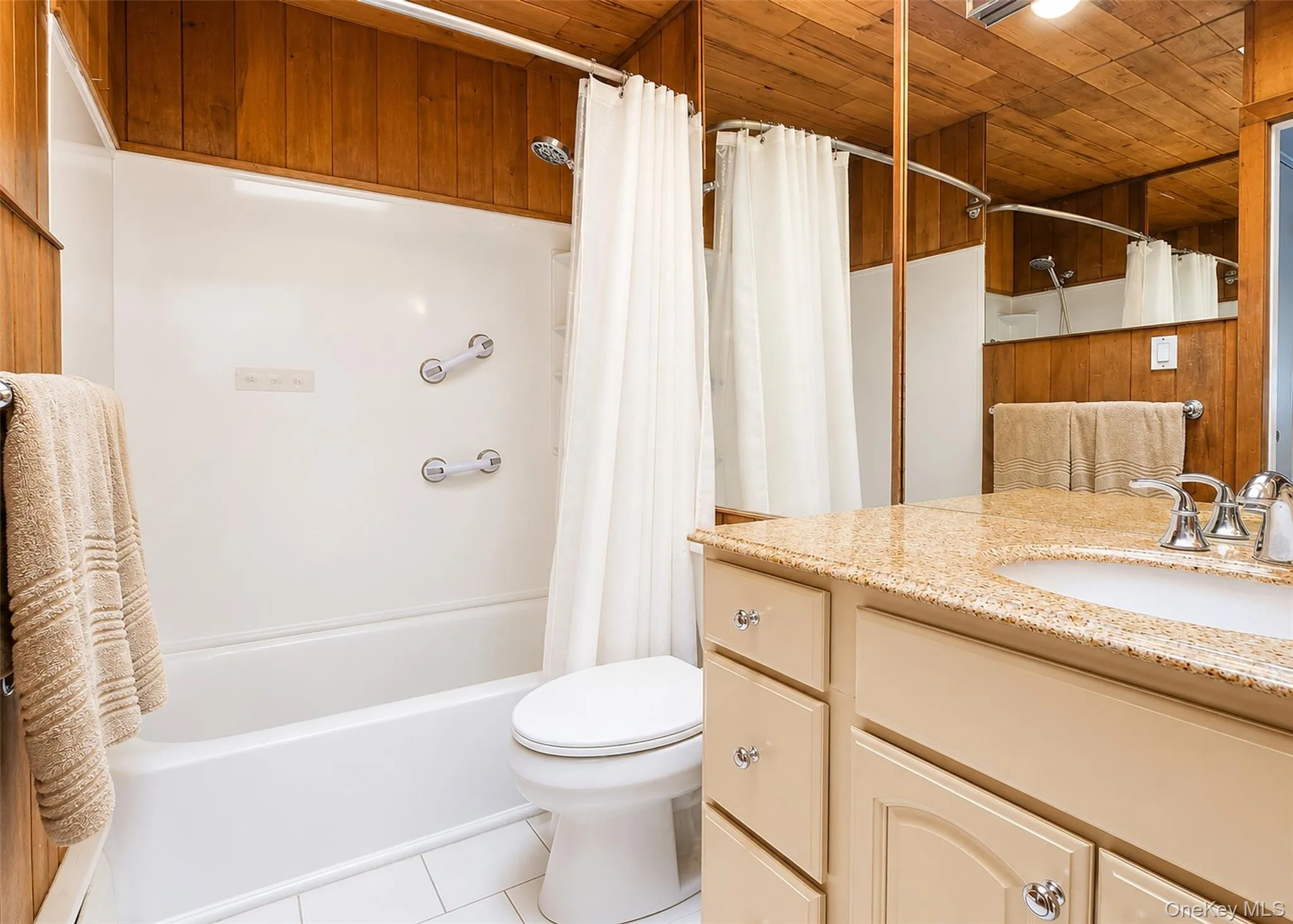 Shower/Tub Combo & Tile Flooring. Shower/Tub Combo & Tile Flooring.