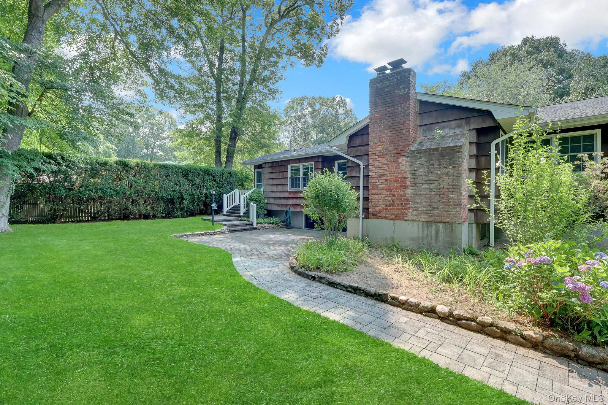 paver sidewalk. fully fenced back yard paver sidewalk. fully fenced back yard