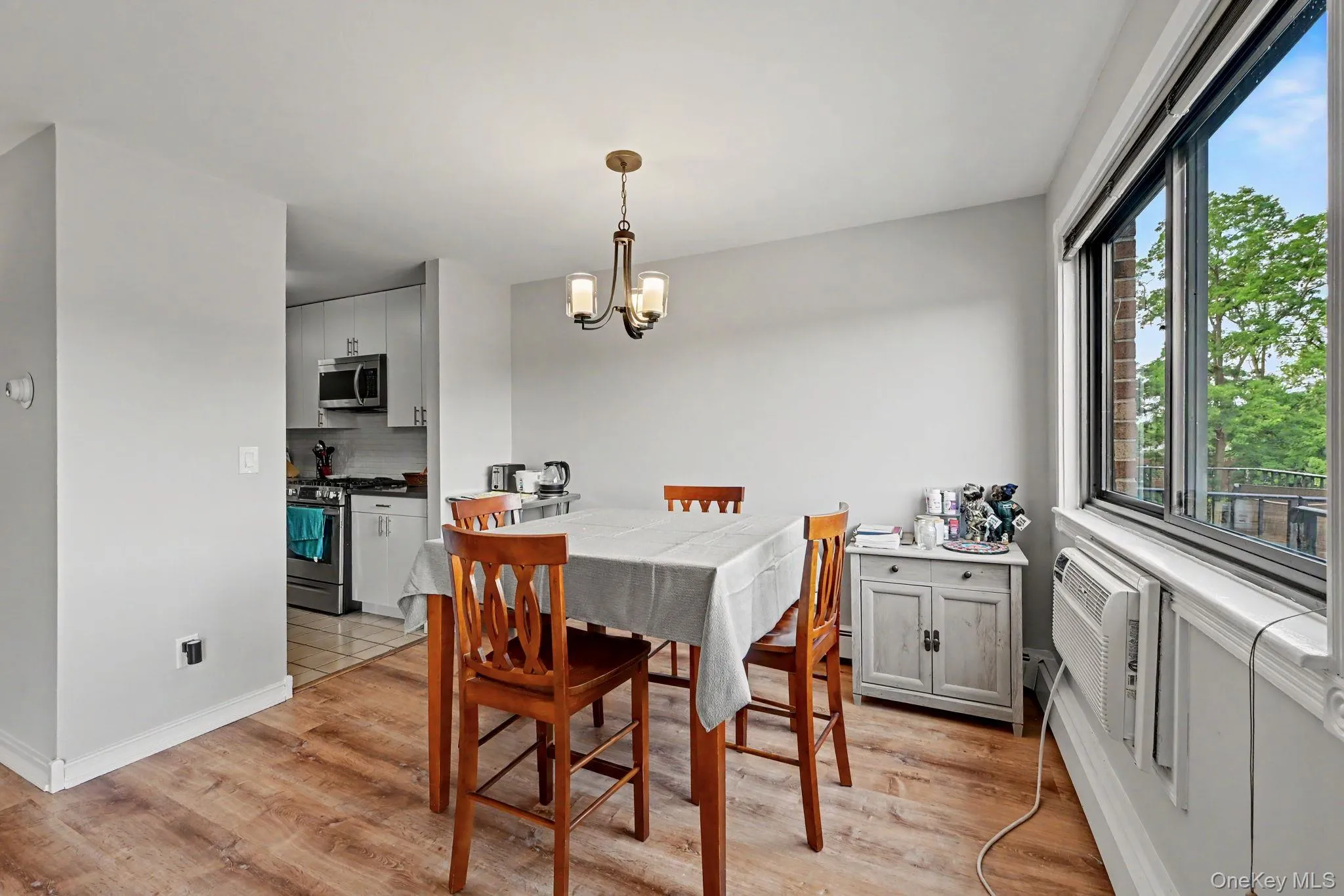 Dining Area with Kitchen on the left. Dining Area with Kitchen on the left.