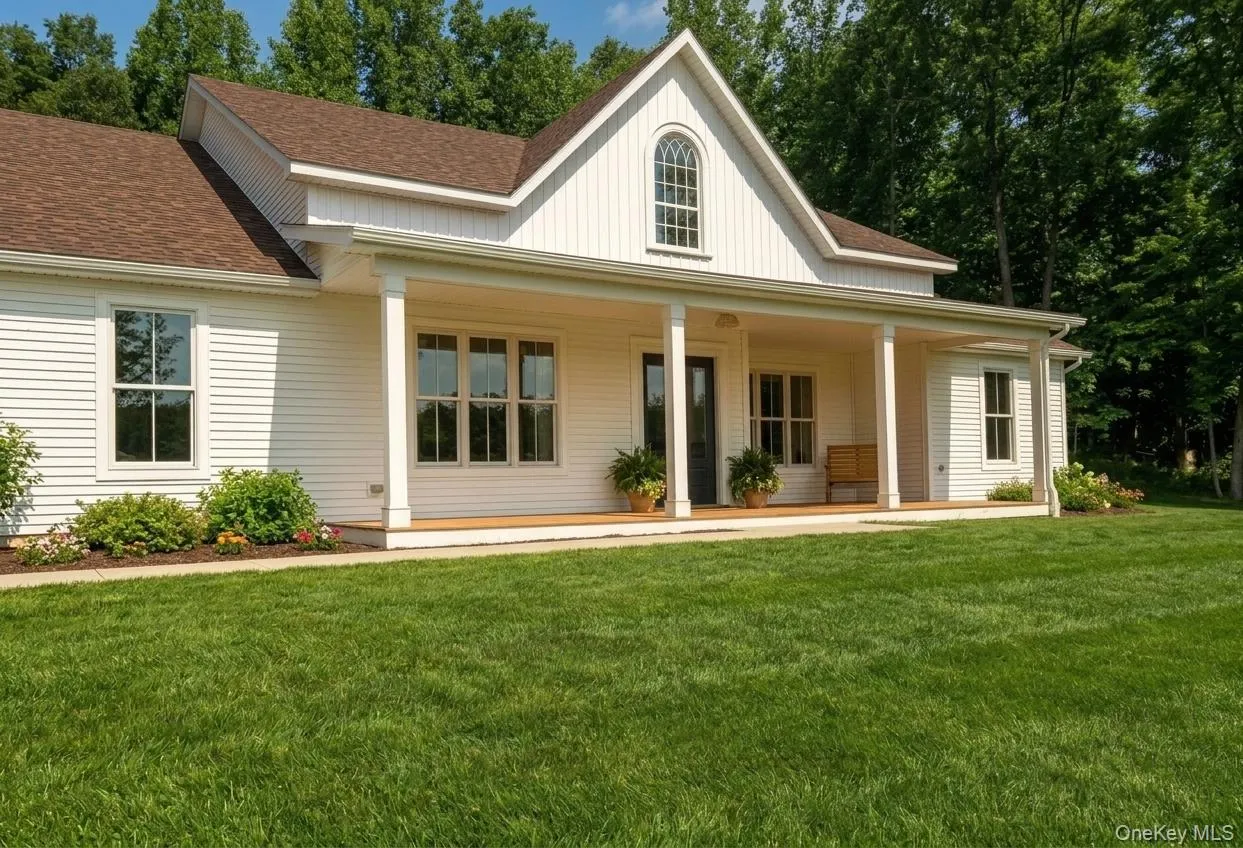 Depicts previously built farmhouse with same builders. Front porch will be changed to more maintenance free materials. All subject to change Depicts previously built farmhouse with same builders. Front porch will be changed to more maintenance free materials. All subject to change