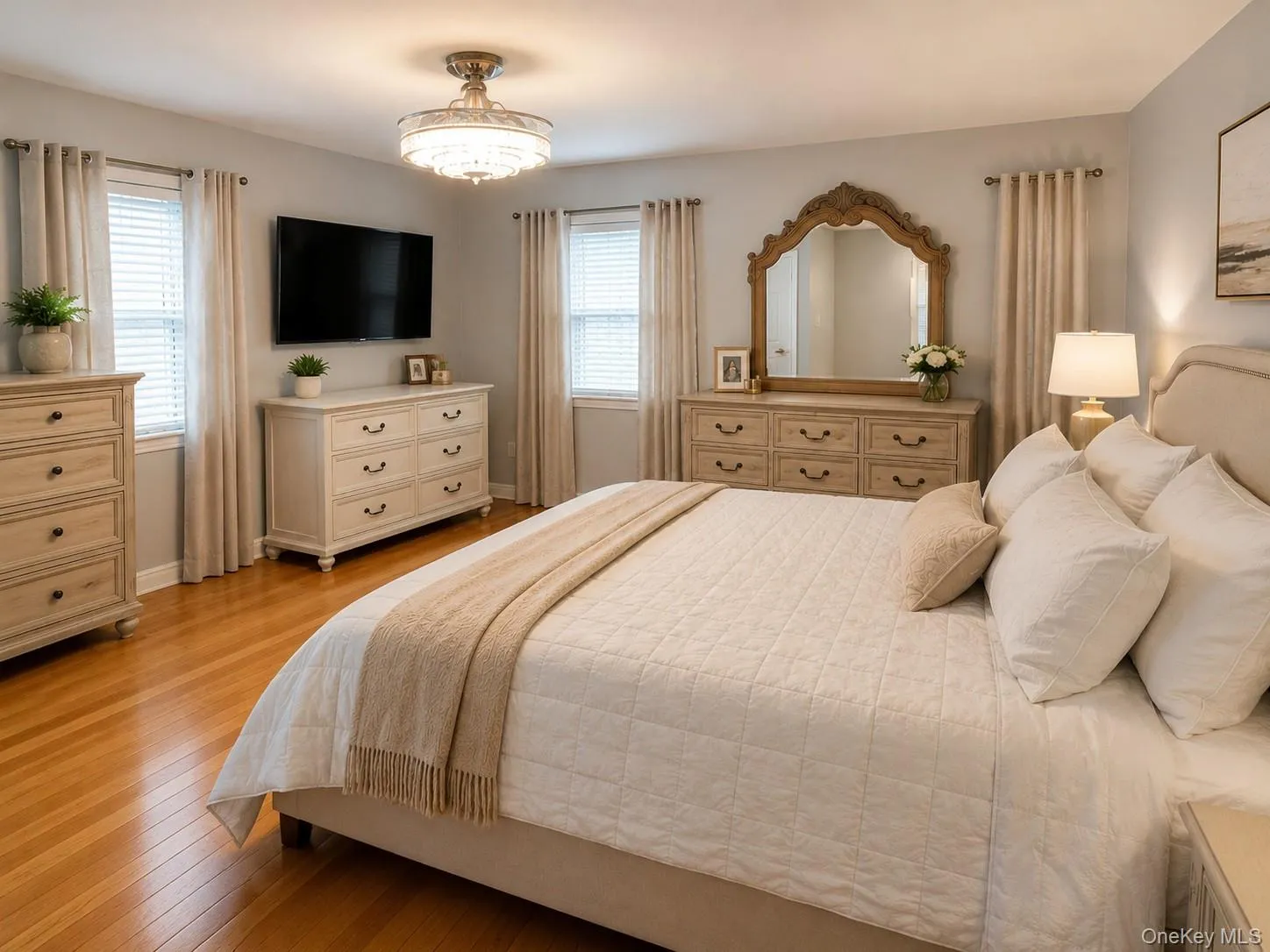 Virtually staged Bedroom featuring hardwood flooring Virtually staged Bedroom featuring hardwood flooring
