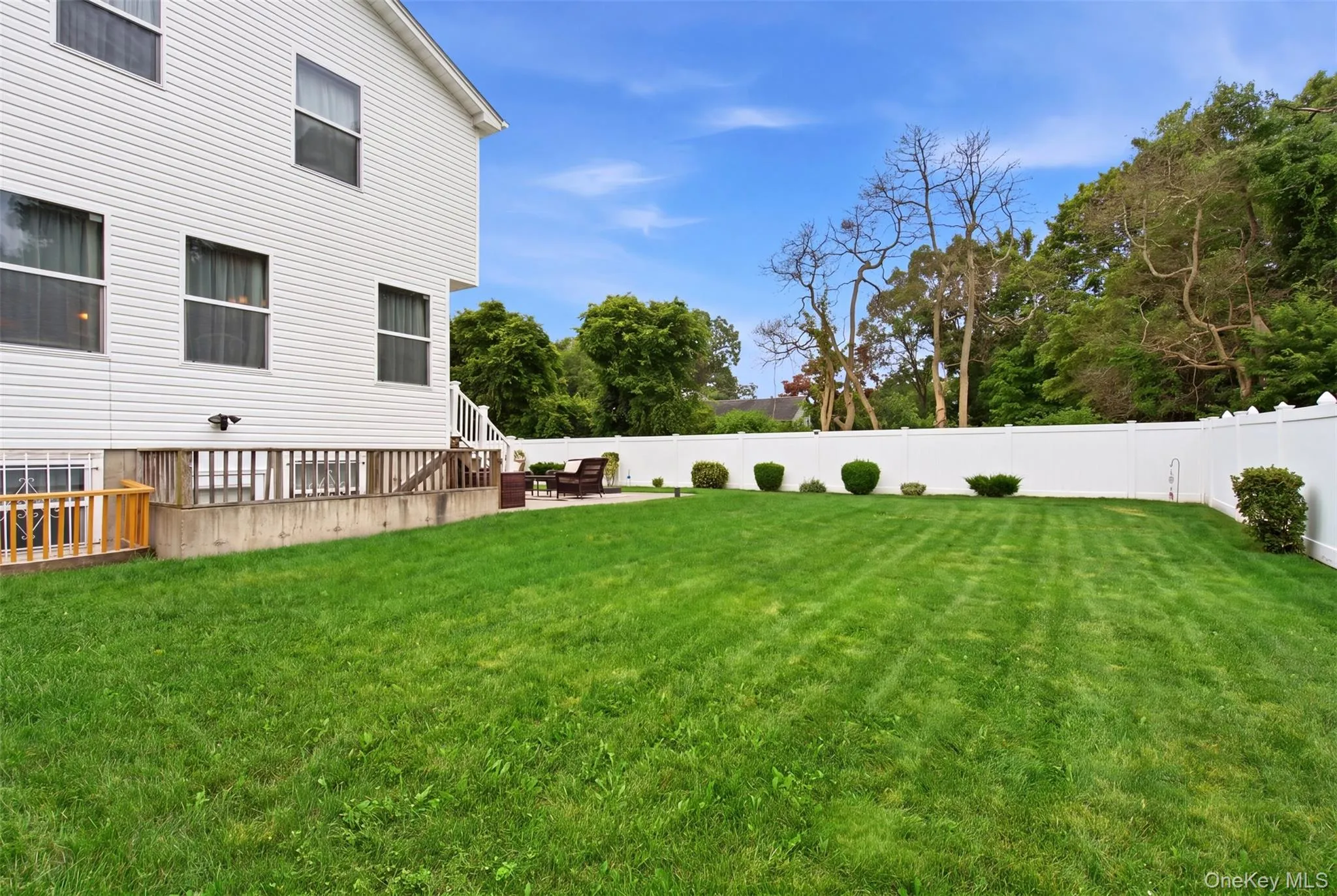 Spacious side yard with outside entry to lower level Spacious side yard with outside entry to lower level