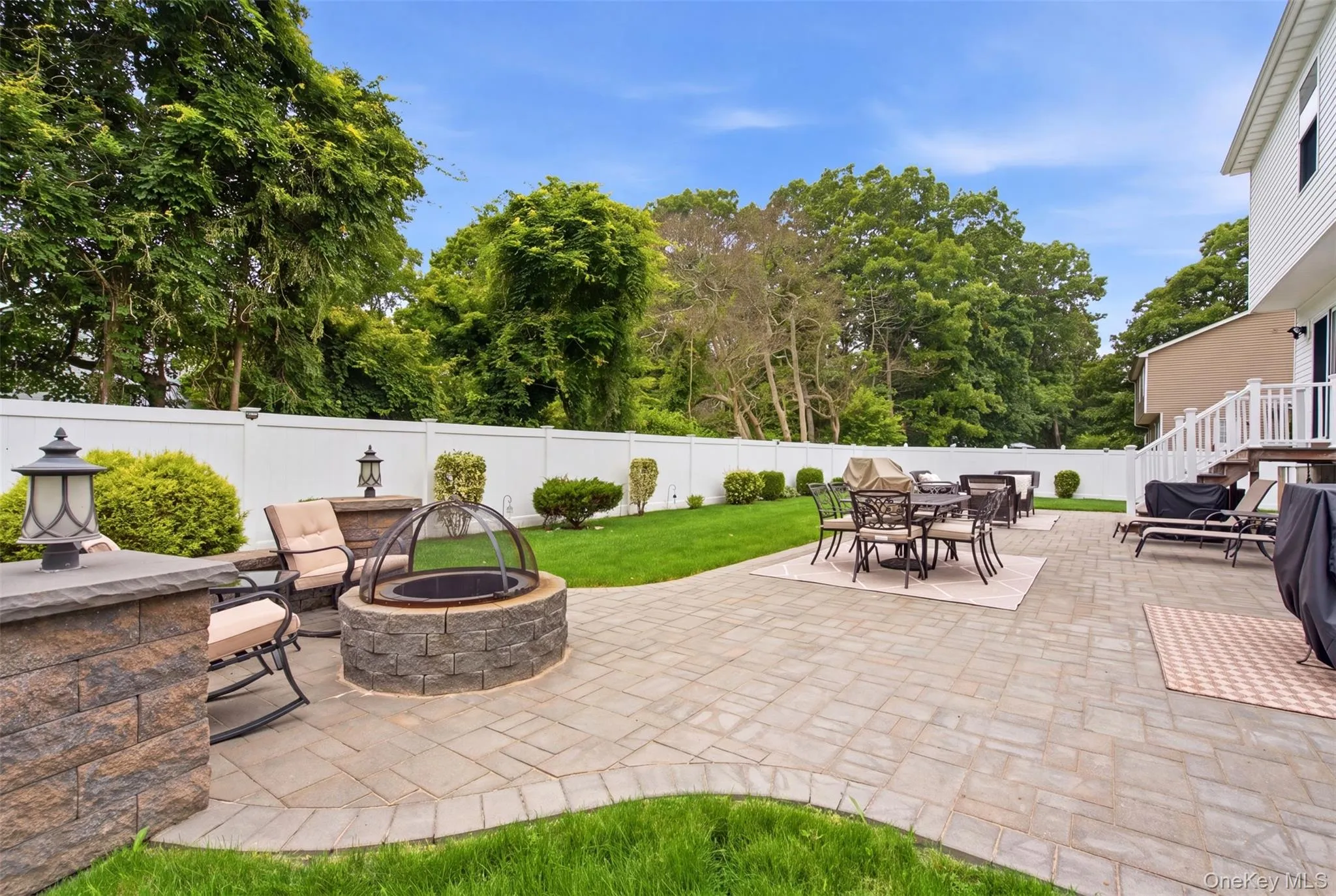 Beautiful paver patio offers great space for entertaining or just relaxing summer bbq Beautiful paver patio offers great space for entertaining or just relaxing summer bbq