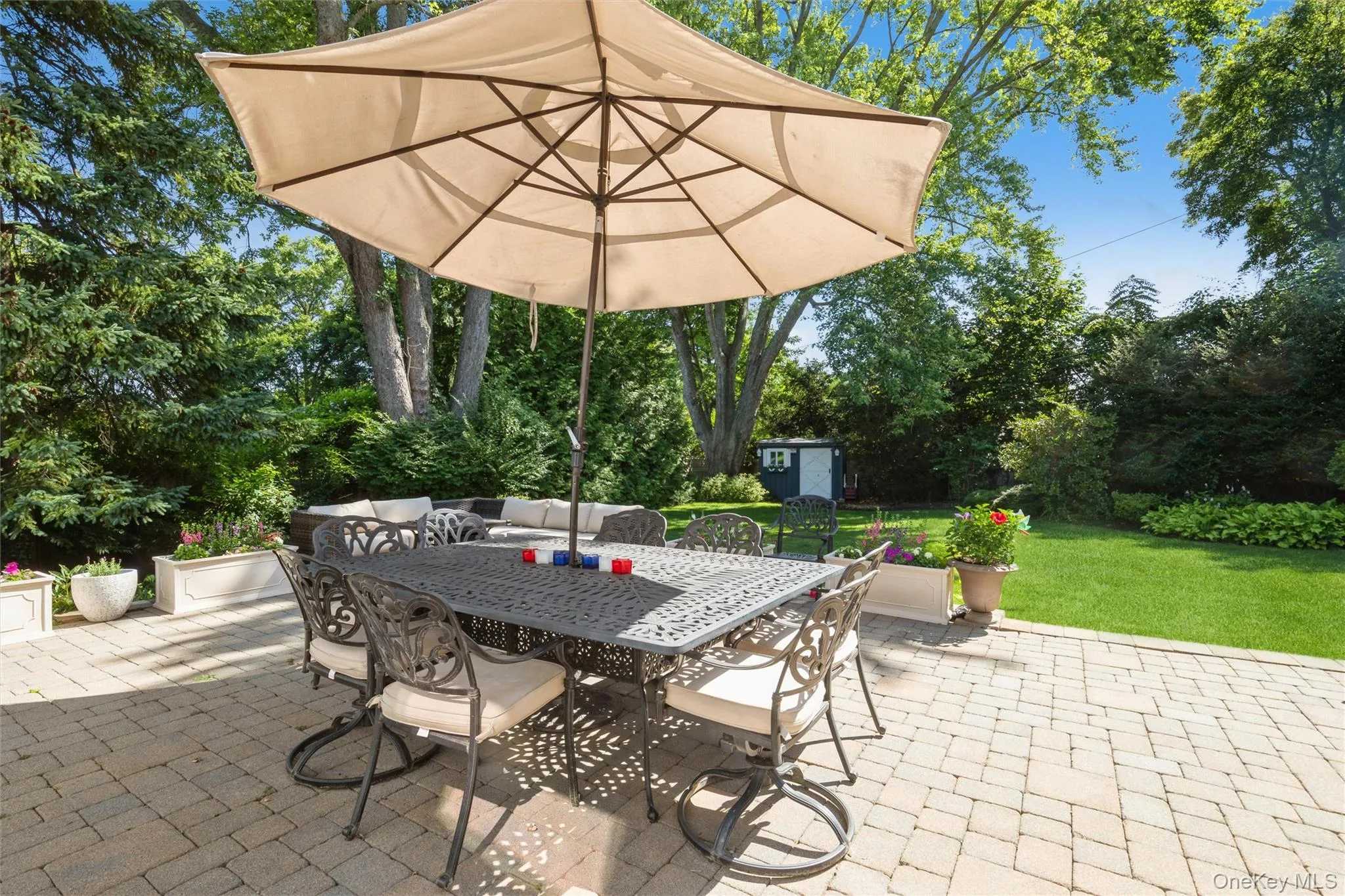Ideal setting for large gatherings or quiet evenings surrounded by mature plantings and colorfull gardens. Ideal setting for large gatherings or quiet evenings surrounded by mature plantings and colorfull gardens.