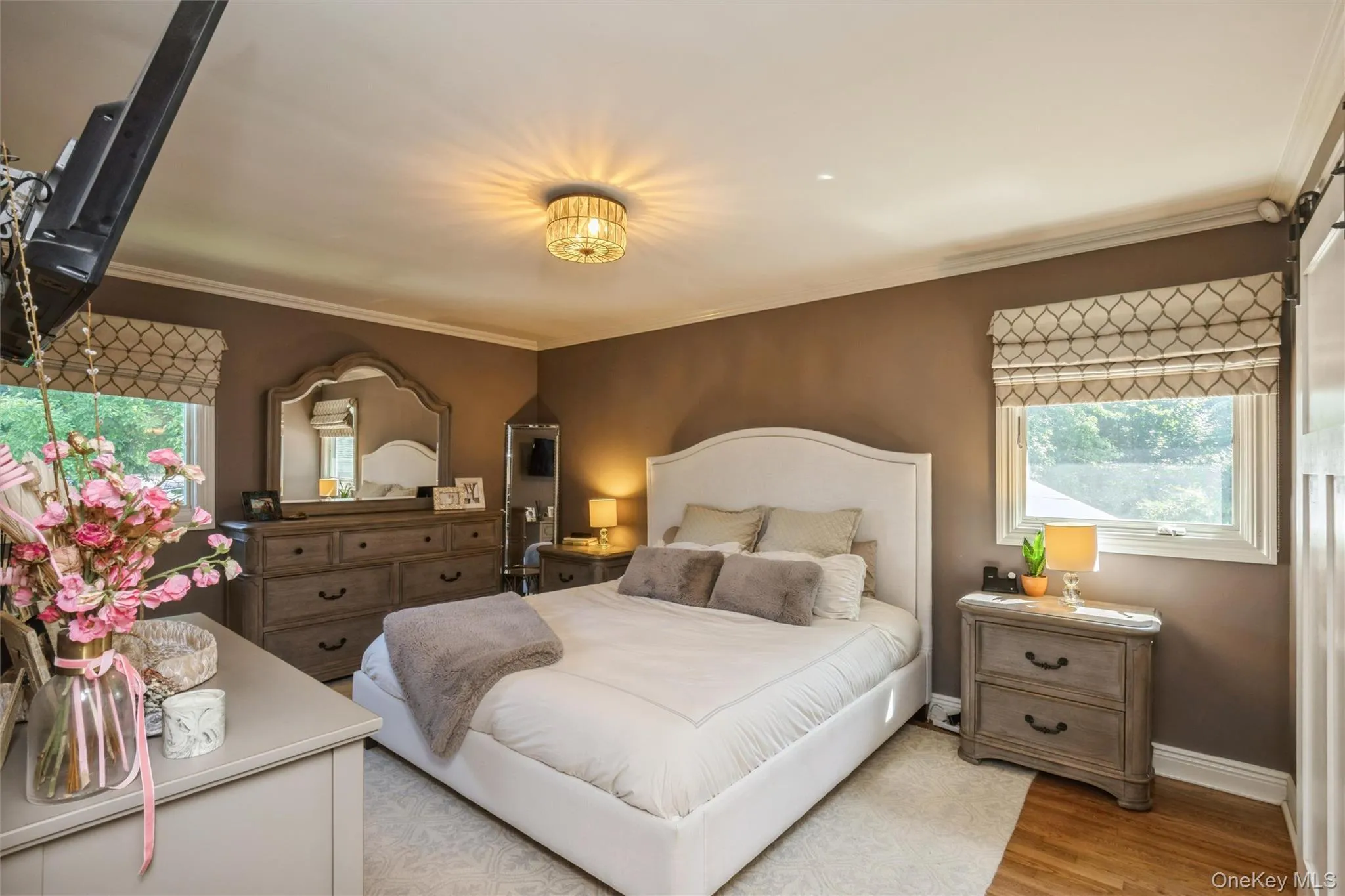 Primary bedroom is a serene retreat featuring a walk-in closet. Primary bedroom is a serene retreat featuring a walk-in closet.