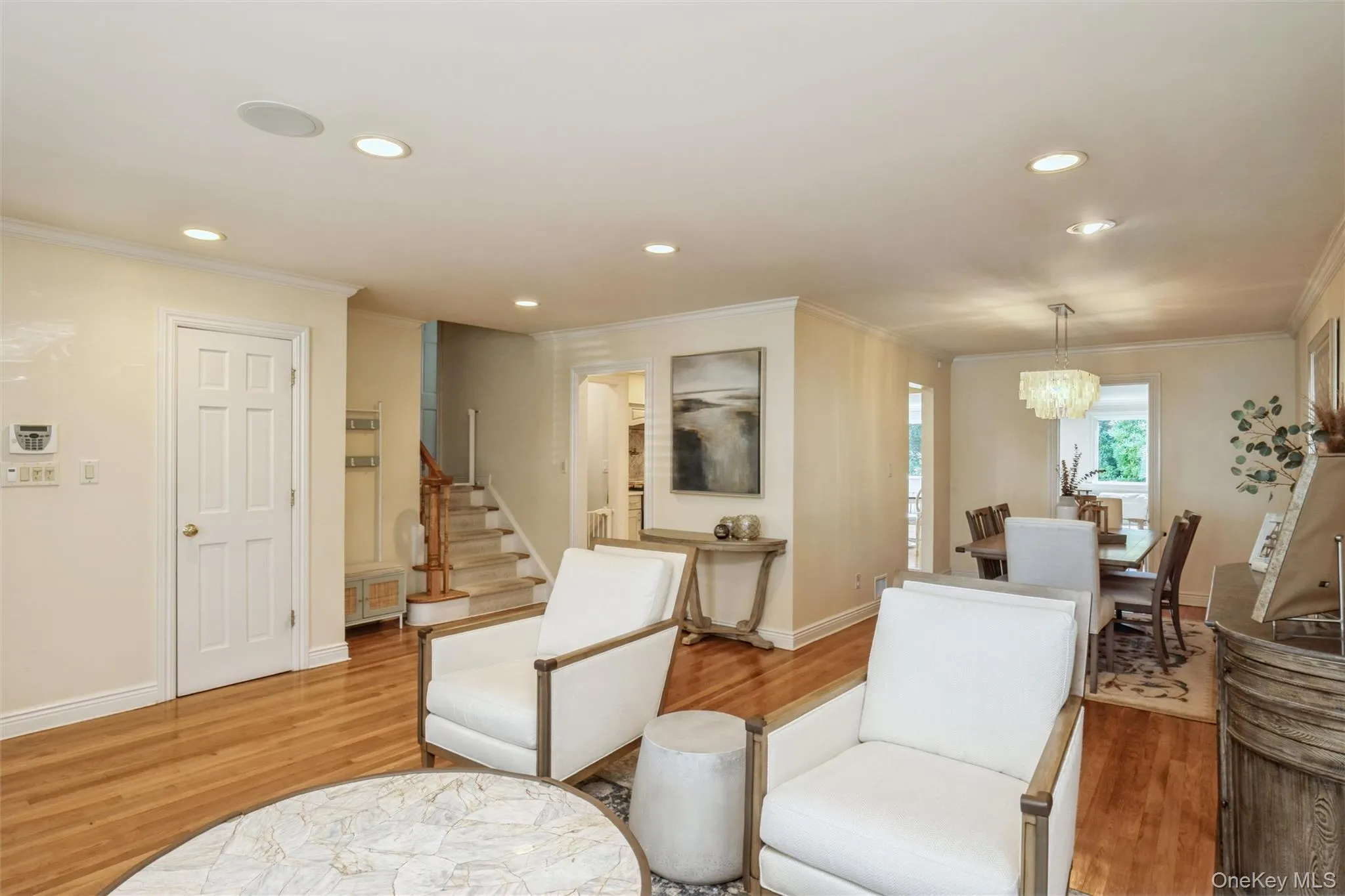 Natural light and hardwood floors warm the interiors. Natural light and hardwood floors warm the interiors.