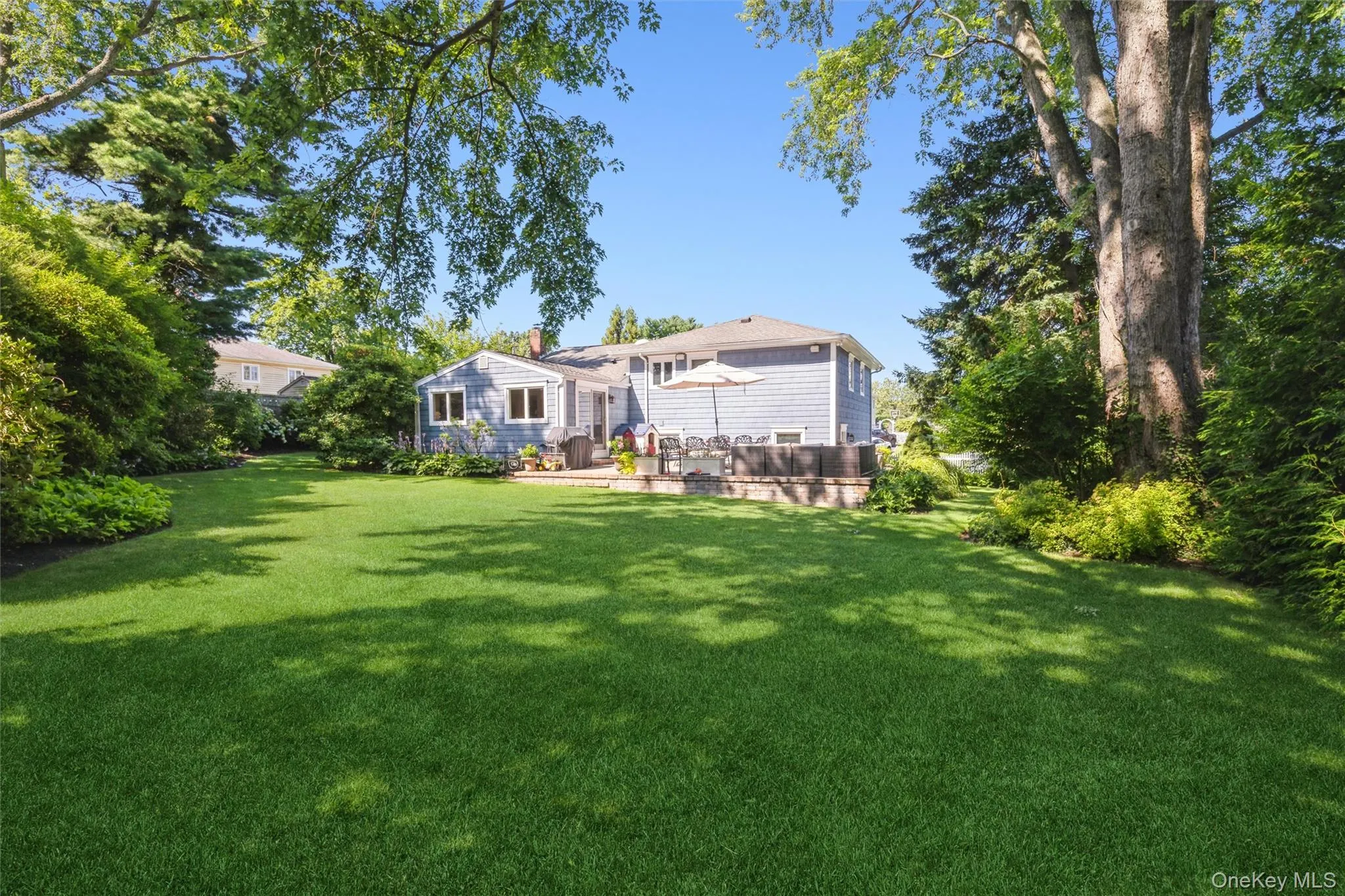 The grounds are a private oasis with mature specimen plantings and vibrant perennial gardens. The grounds are a private oasis with mature specimen plantings and vibrant perennial gardens.