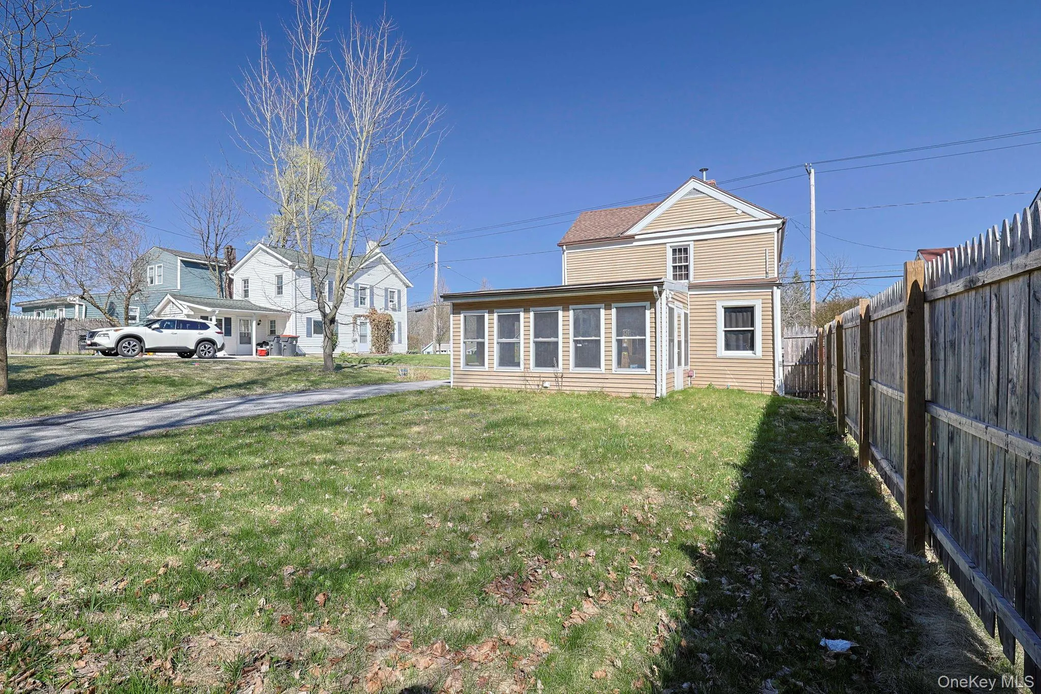 View of yard with fence View of yard with fence