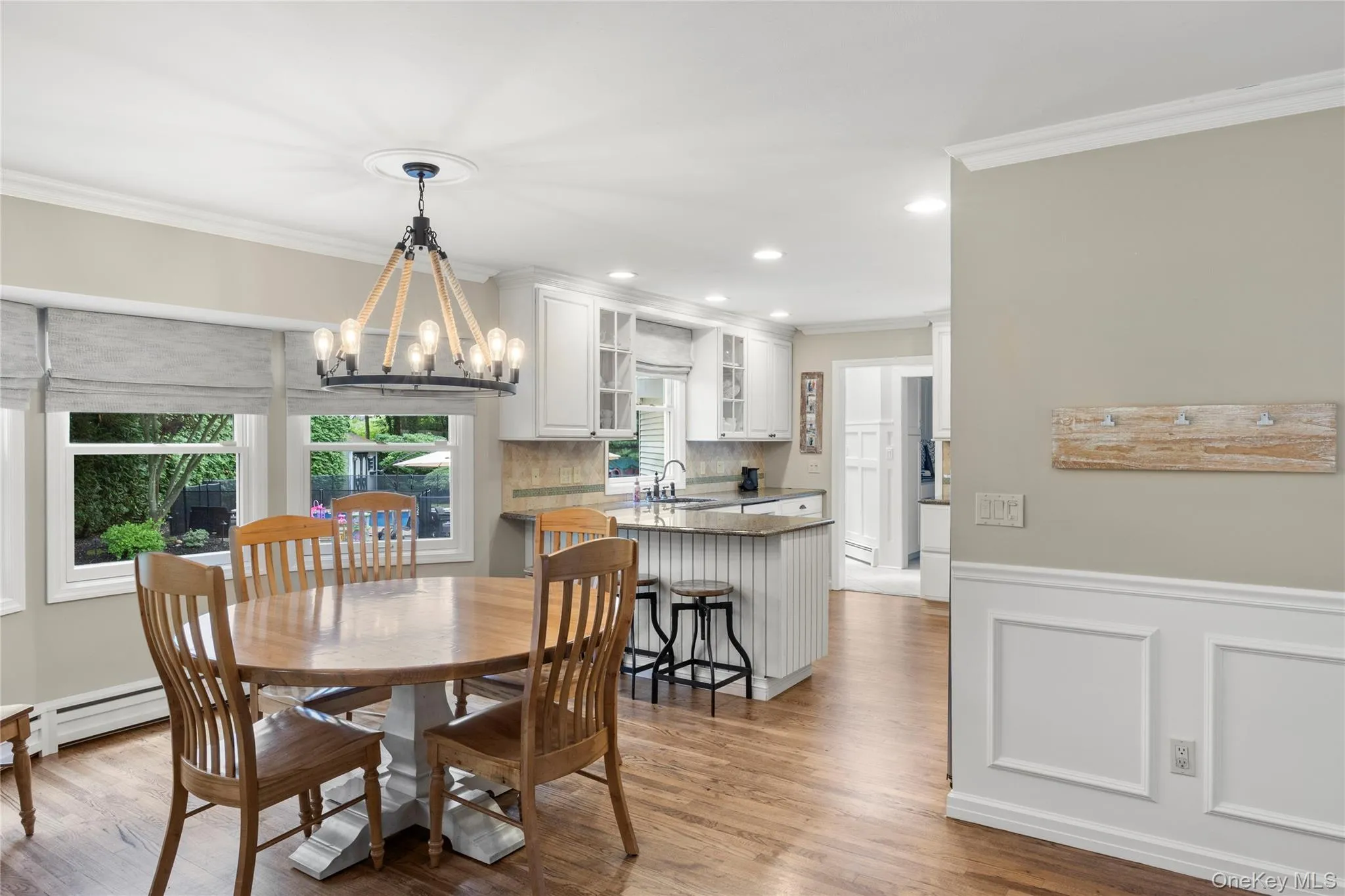 Dining Area Between Family Room & Kitchen Dining Area Between Family Room & Kitchen