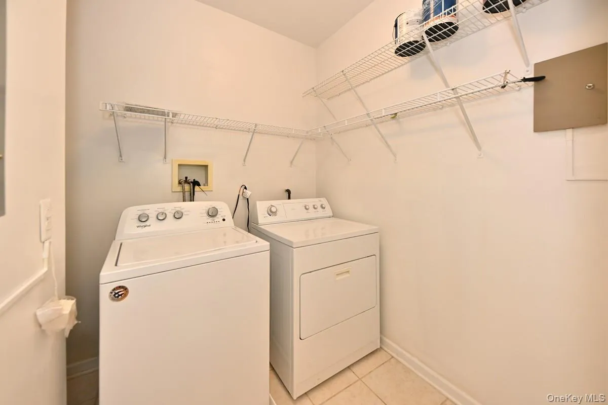 Laundry room off kitchen. Laundry room off kitchen.