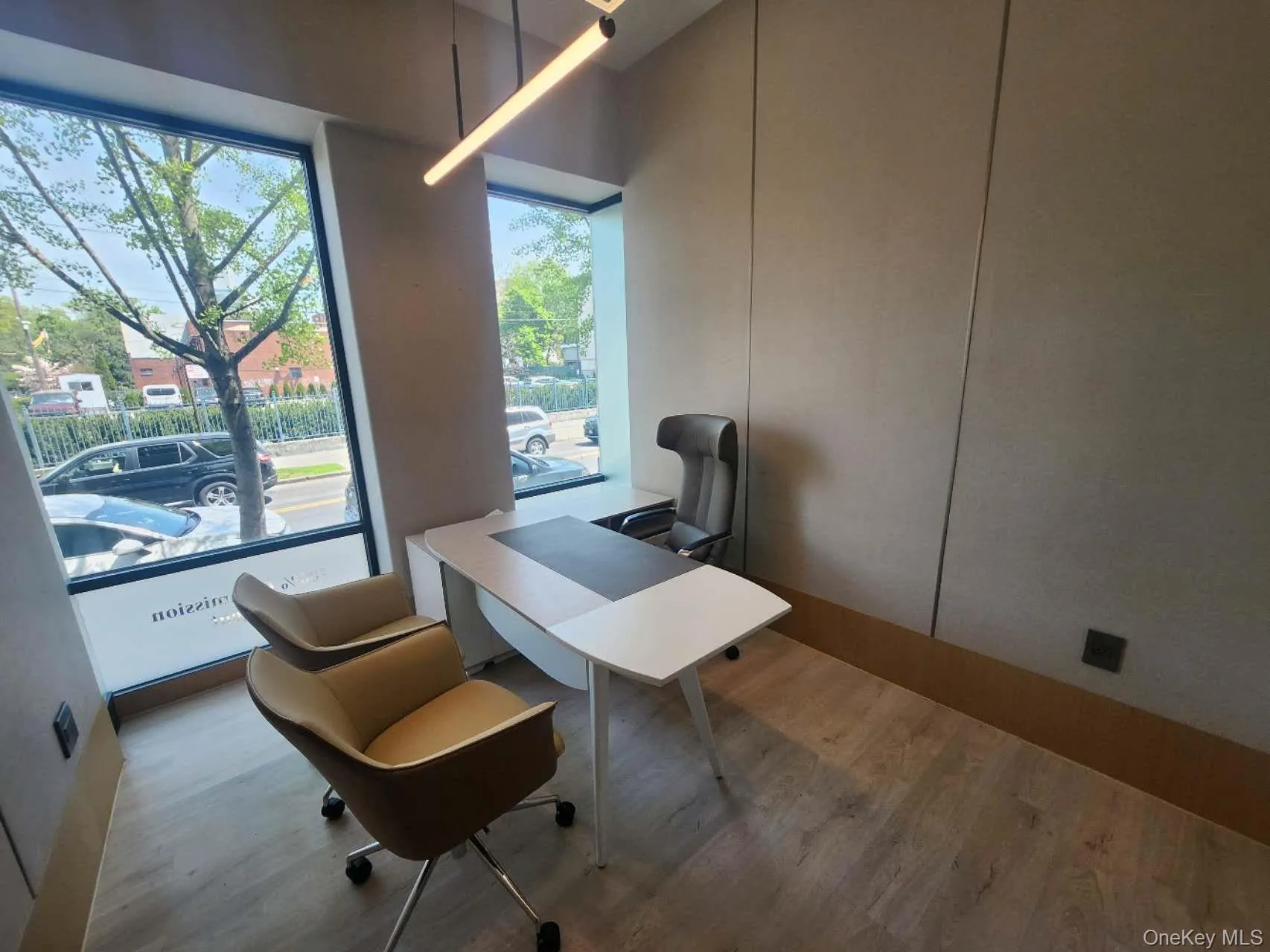 Office with plenty of natural light and wood finished floors Office with plenty of natural light and wood finished floors