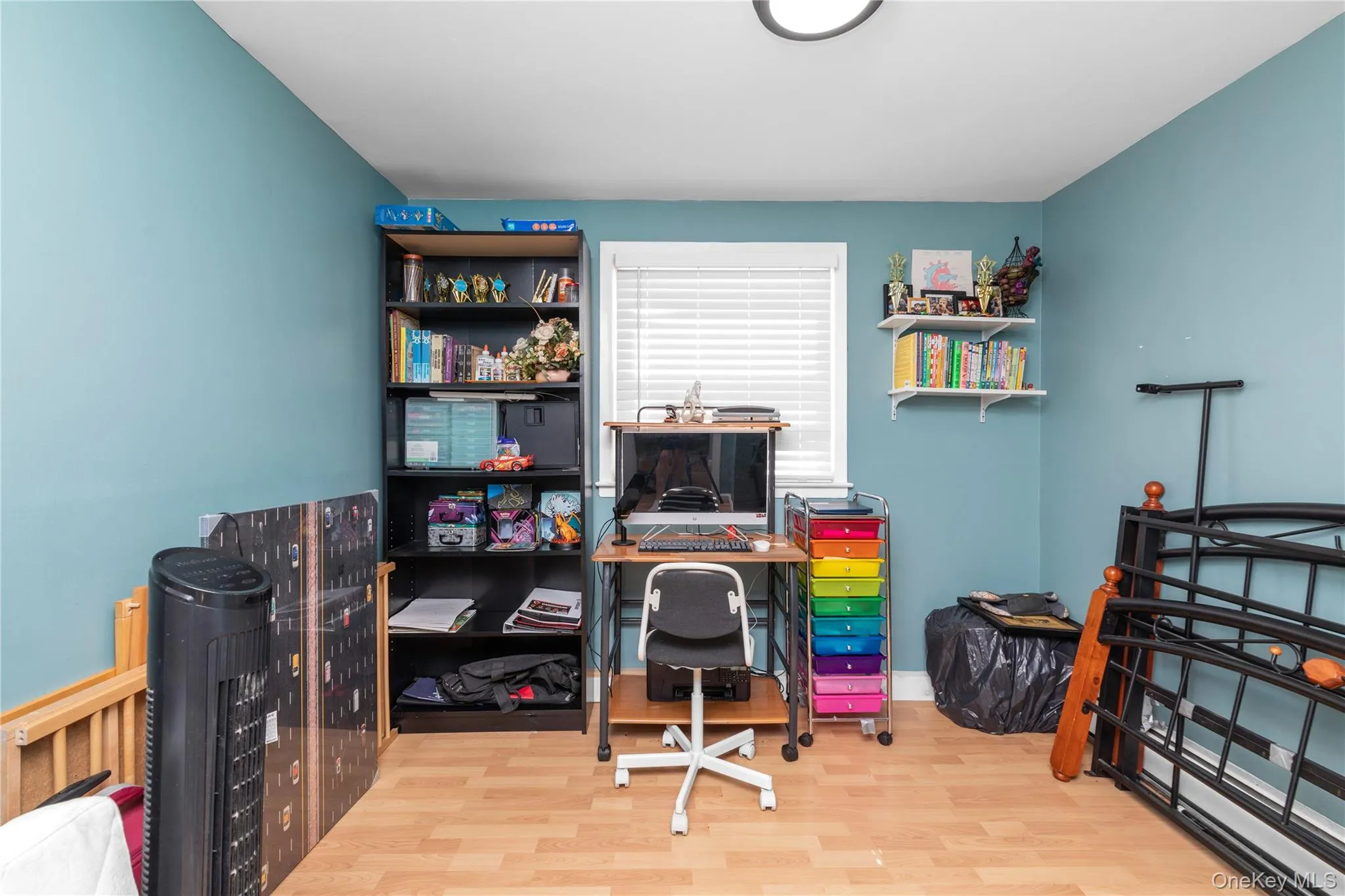 Home office with light wood finished floors and baseboards Home office with light wood finished floors and baseboards