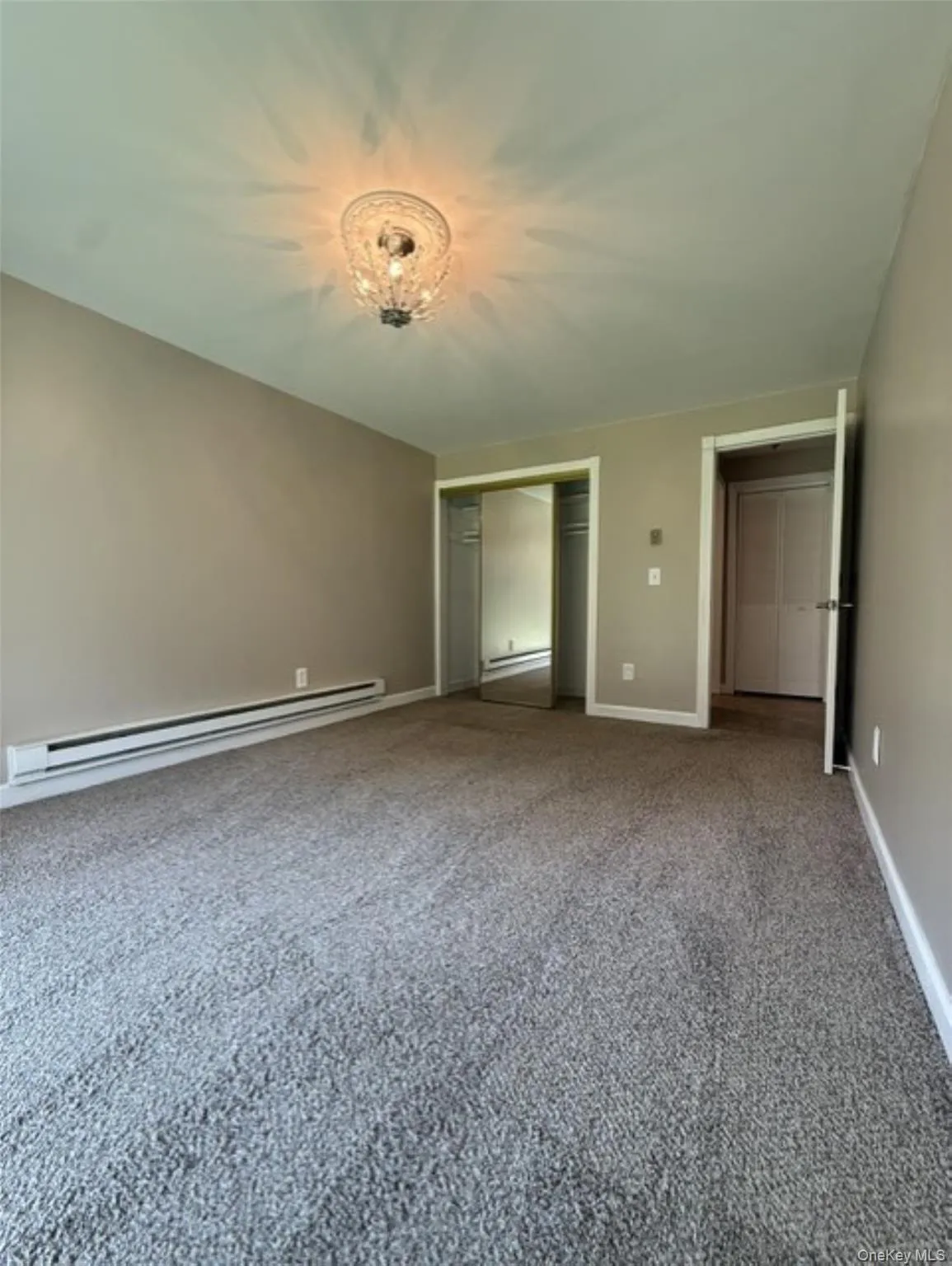 With a large closet and door out to the patio With a large closet and door out to the patio