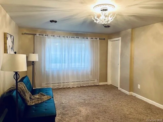 Living room with door out to patio Living room with door out to patio