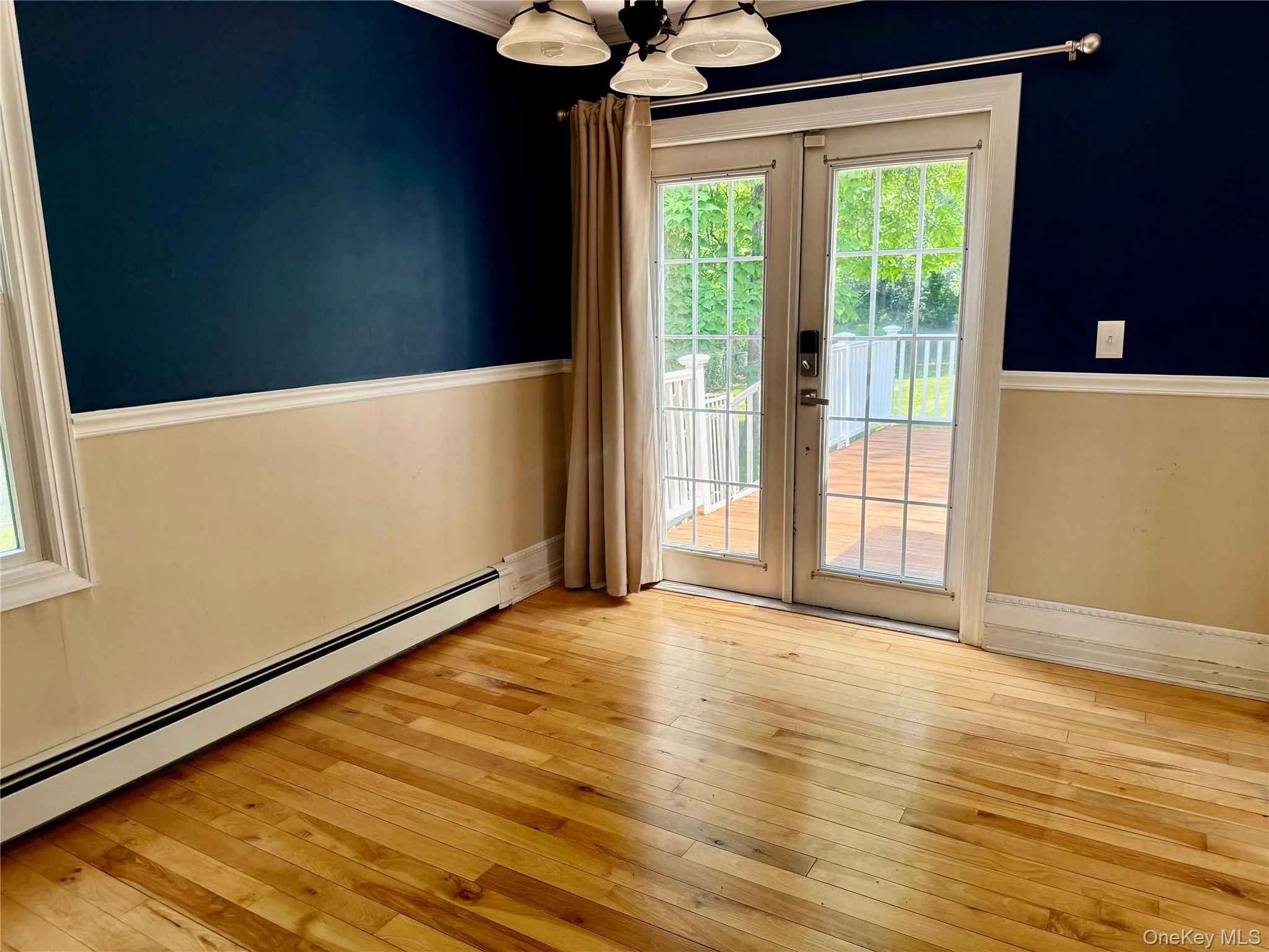 W/ french doors to large deck W/ french doors to large deck