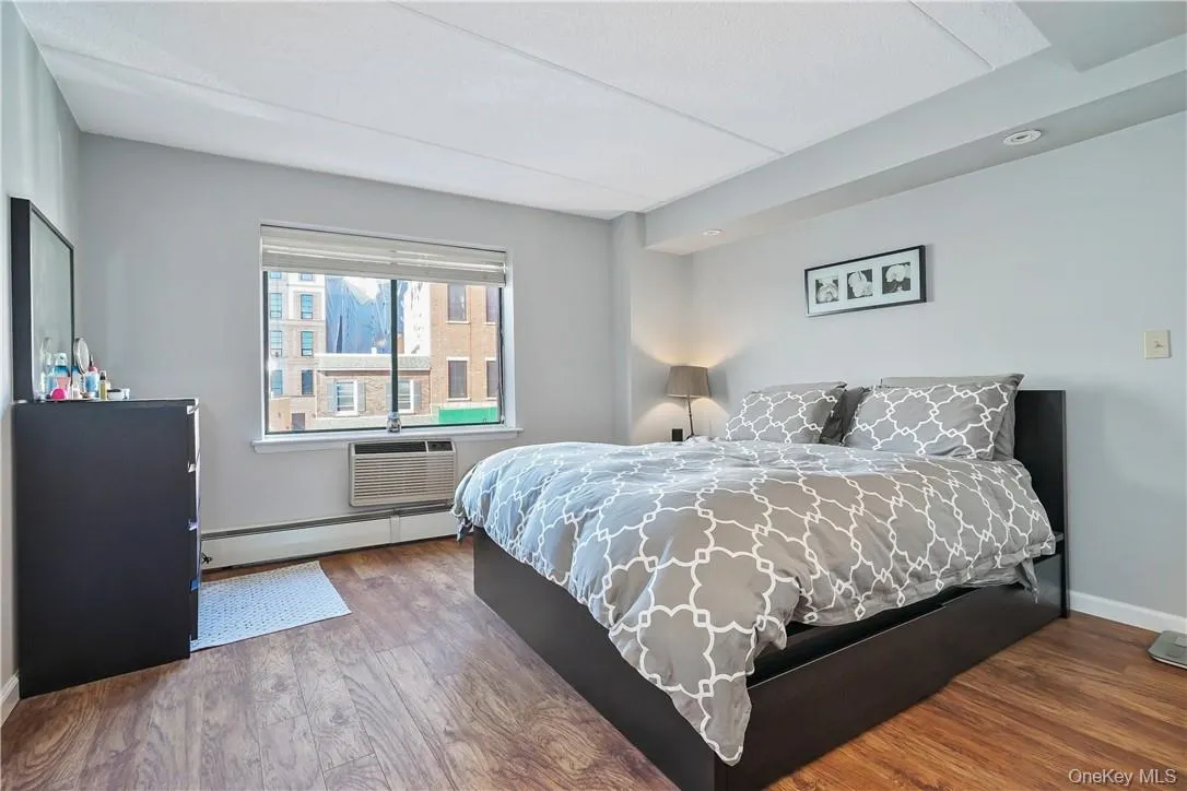 Primary Bedroom With Hardwood Floors Primary Bedroom With Hardwood Floors