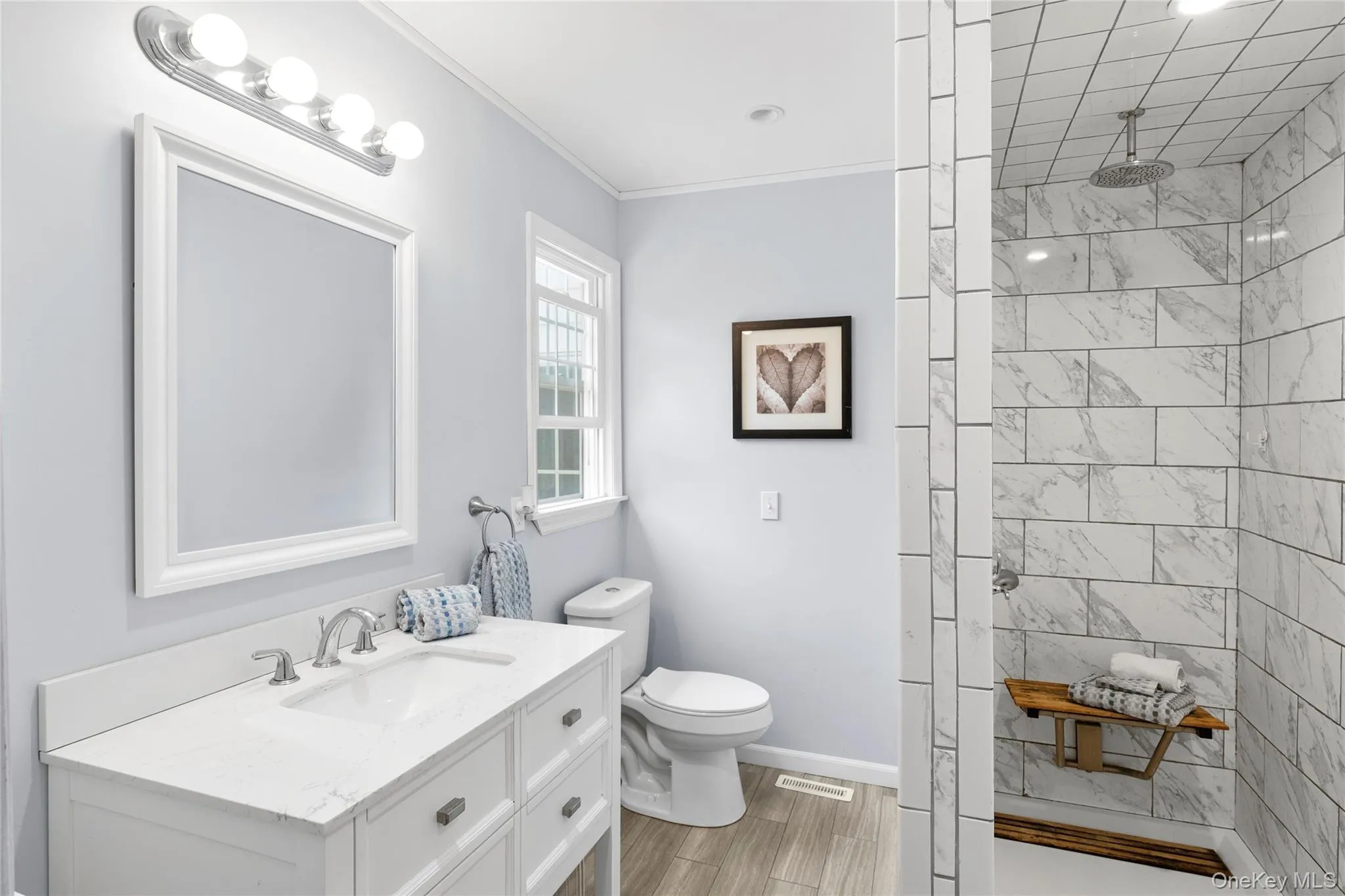 Stunning new spa like primary bathroom with walk in shower. Stunning new spa like primary bathroom with walk in shower.