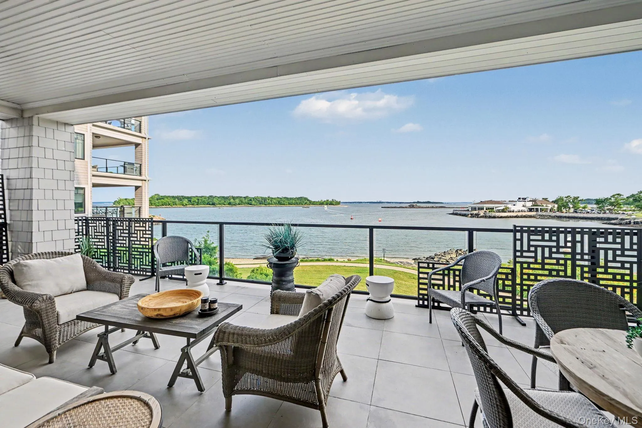 Large covered terrace with unobstructed views of the water Large covered terrace with unobstructed views of the water