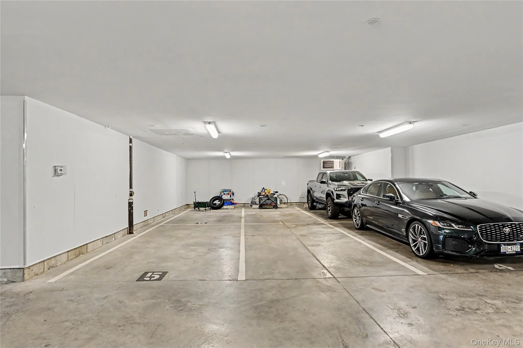 Assigned two car tandem space -center slot in photo Assigned two car tandem space -center slot in photo
